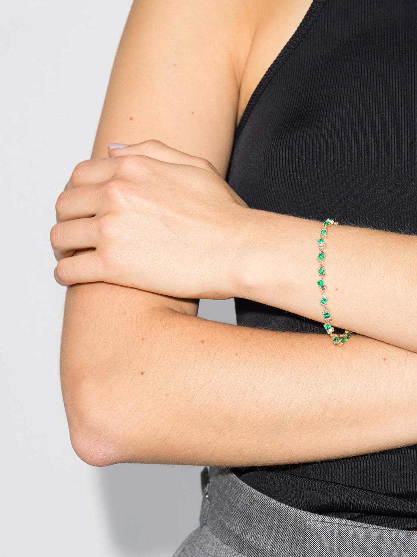 18kt yellow gold, emerald and diamond tennis bracelet