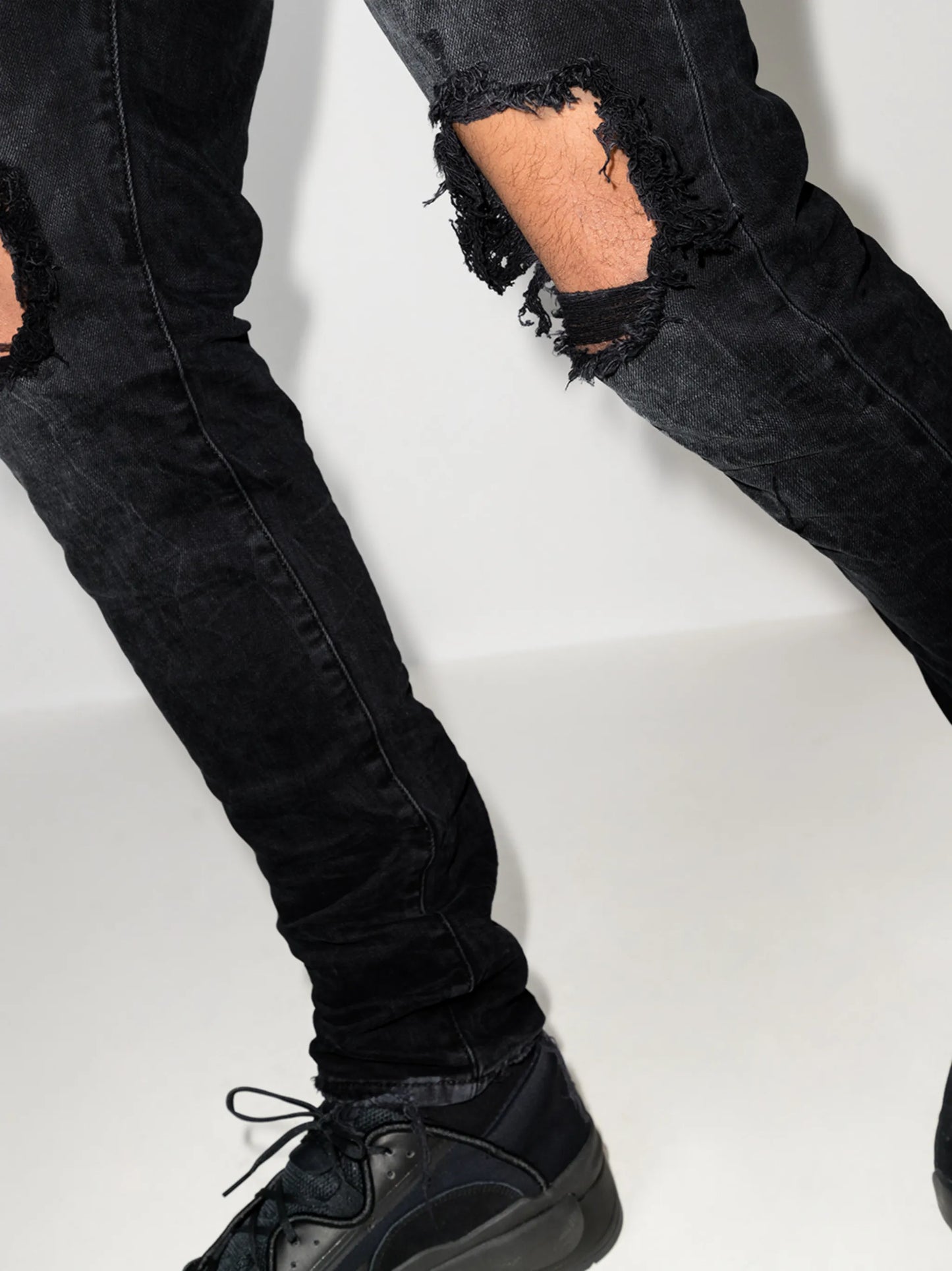 low-rise "Black Wash Blowout" slim jeans