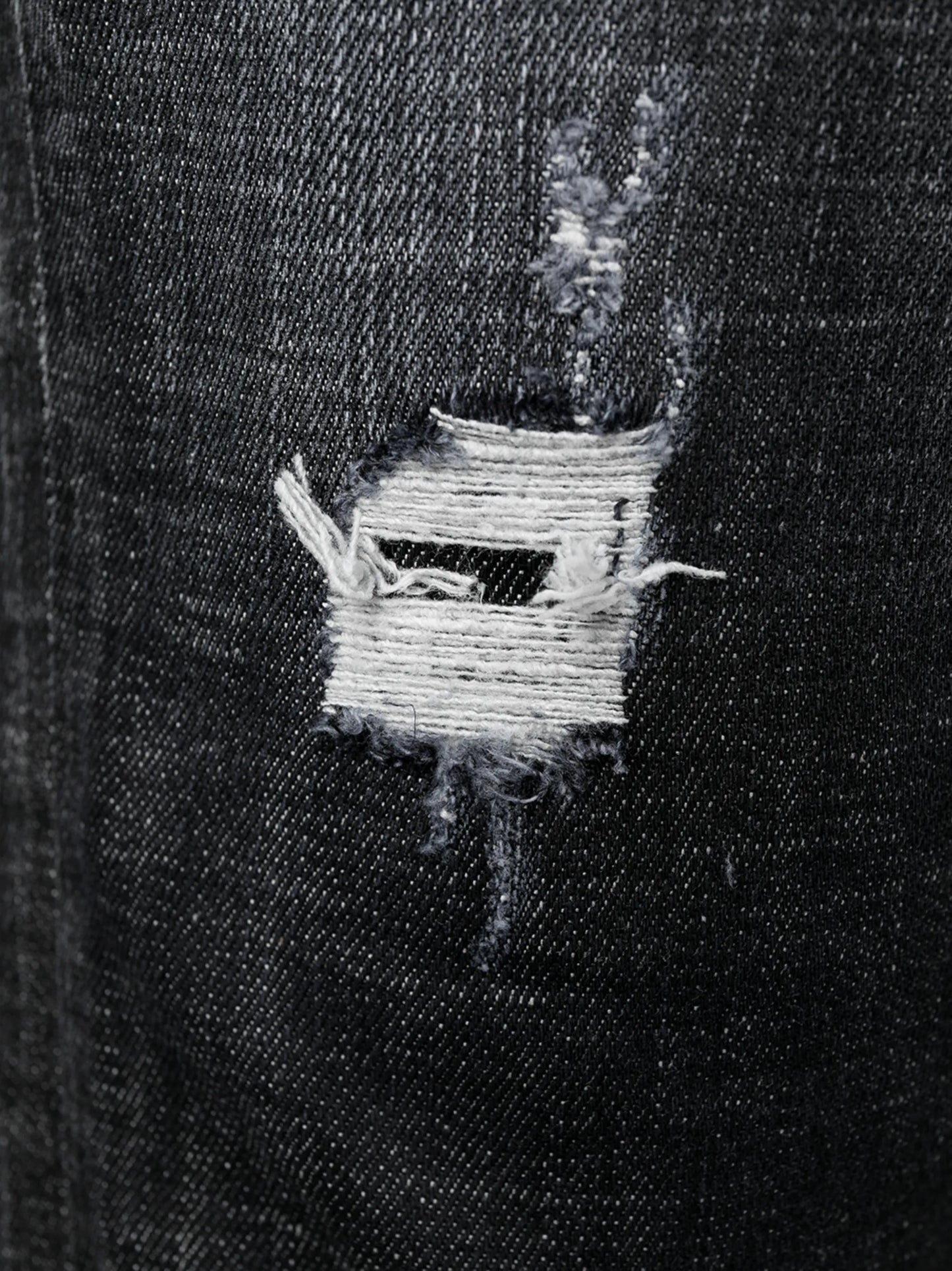 distressed slim-fit jeans