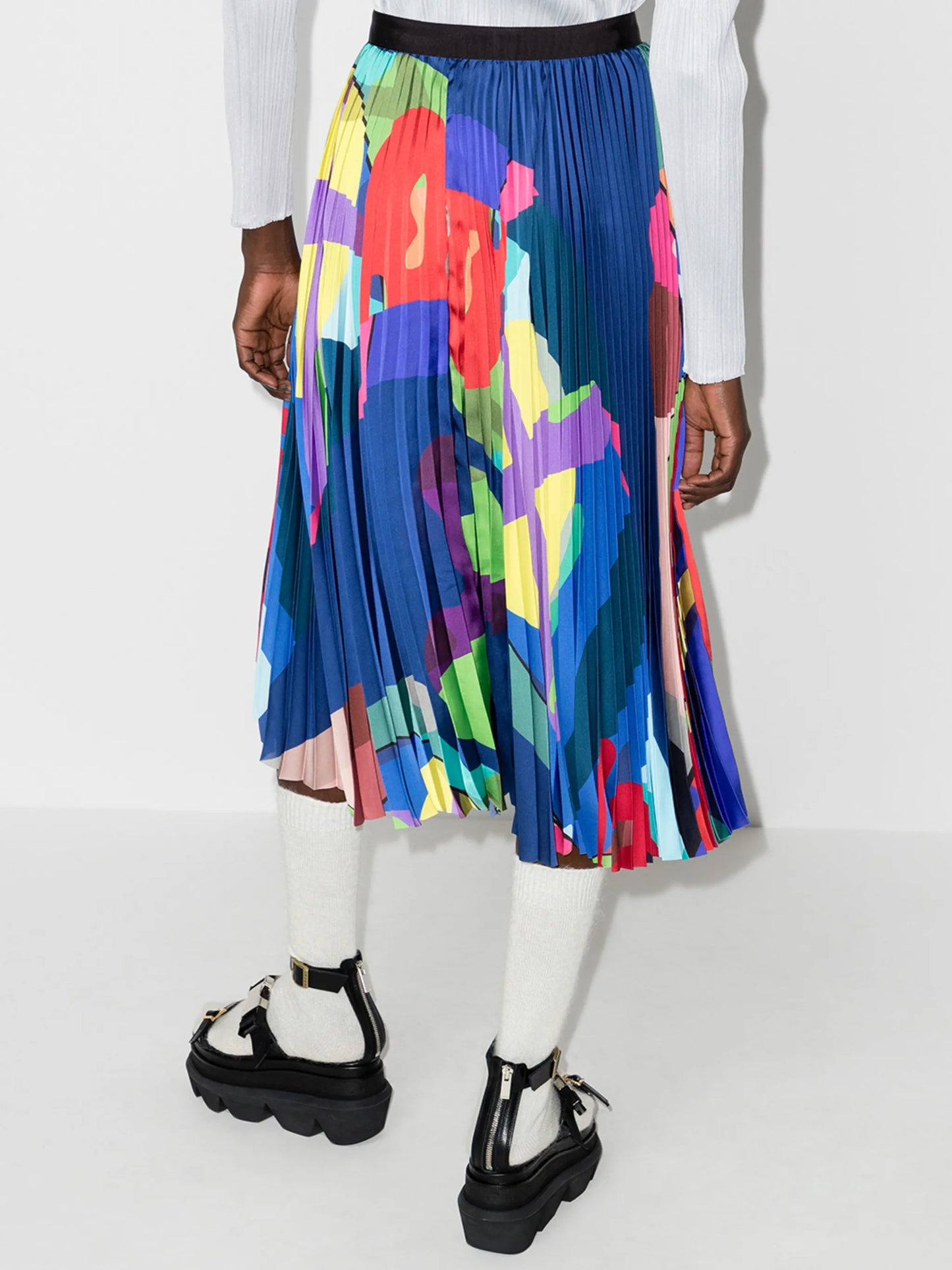 x KAWS print pleated skirt