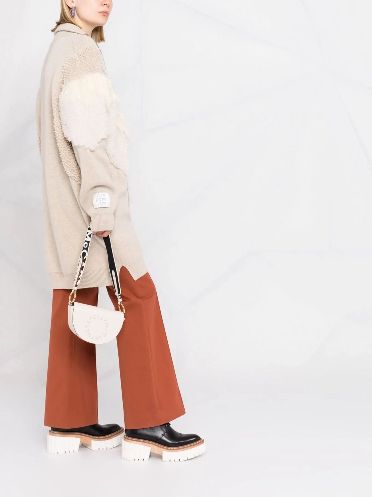 textured-panel knitted coat