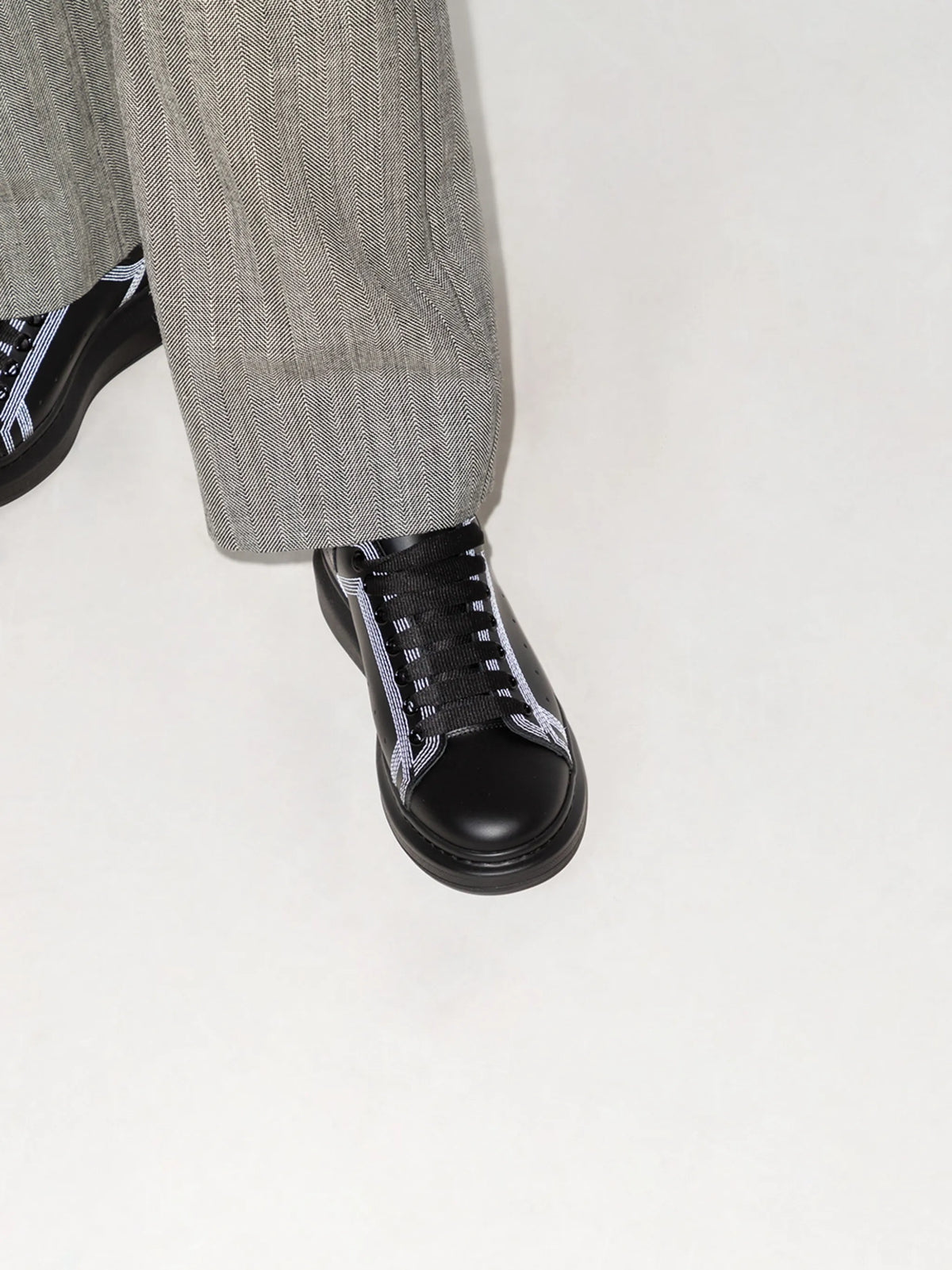Oversized contrast-stitching sneakers