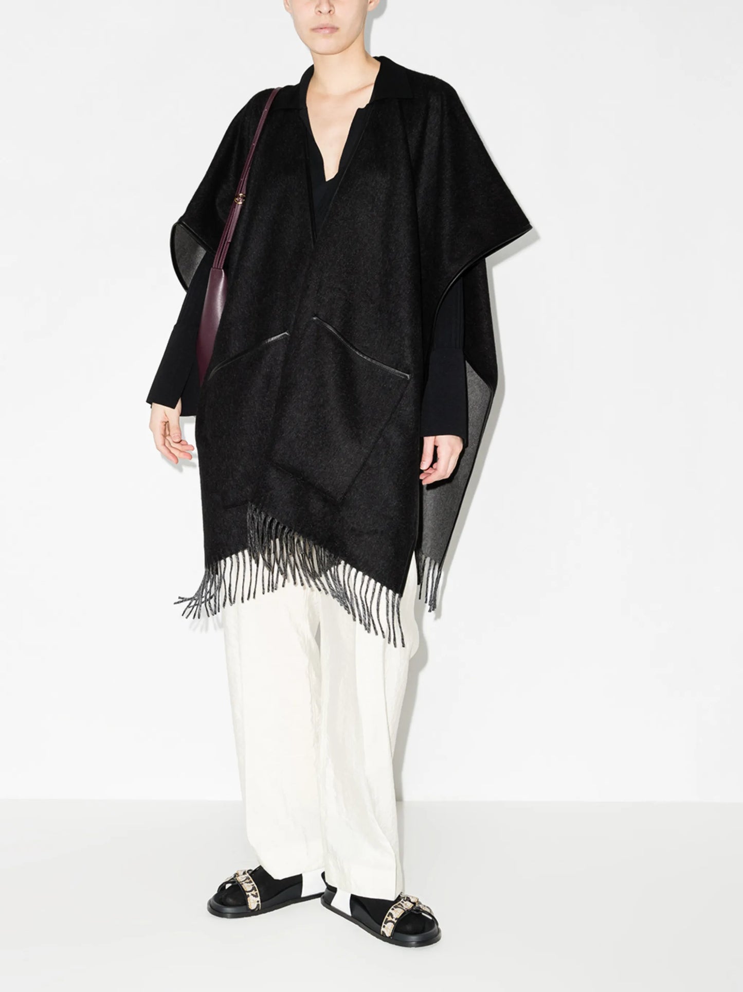 1927 fringed-edge knitted cape