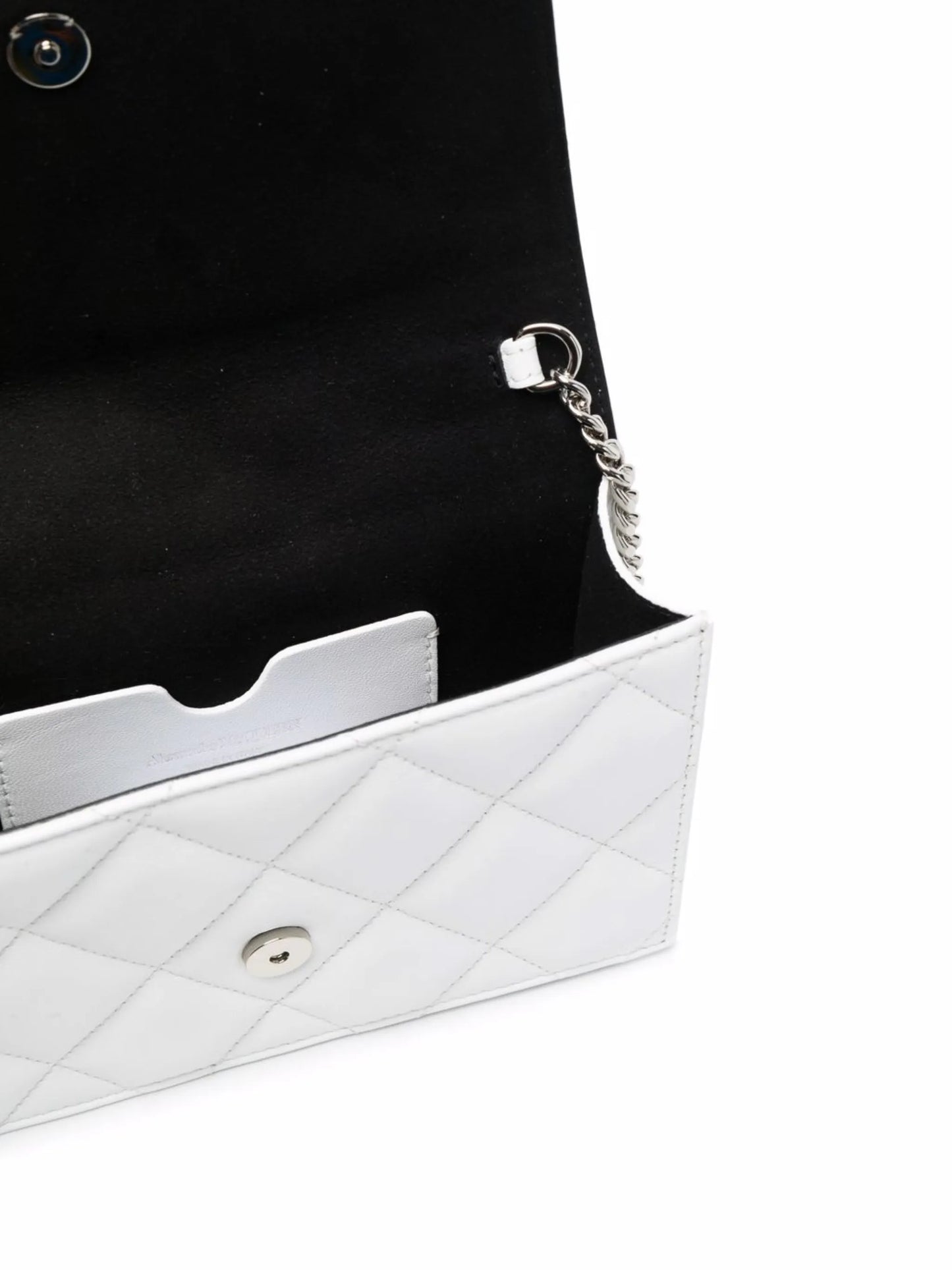 skull-motif quilted crossbody bag