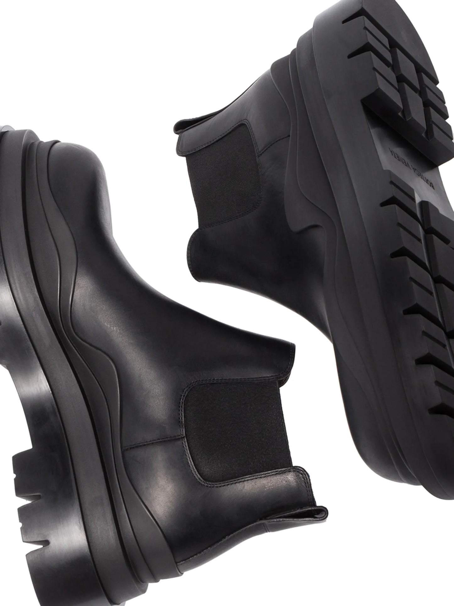 Tire leather ankle boots