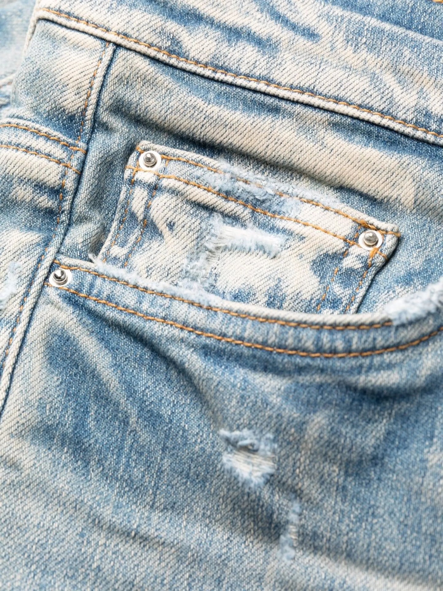 distressed skinny jeans