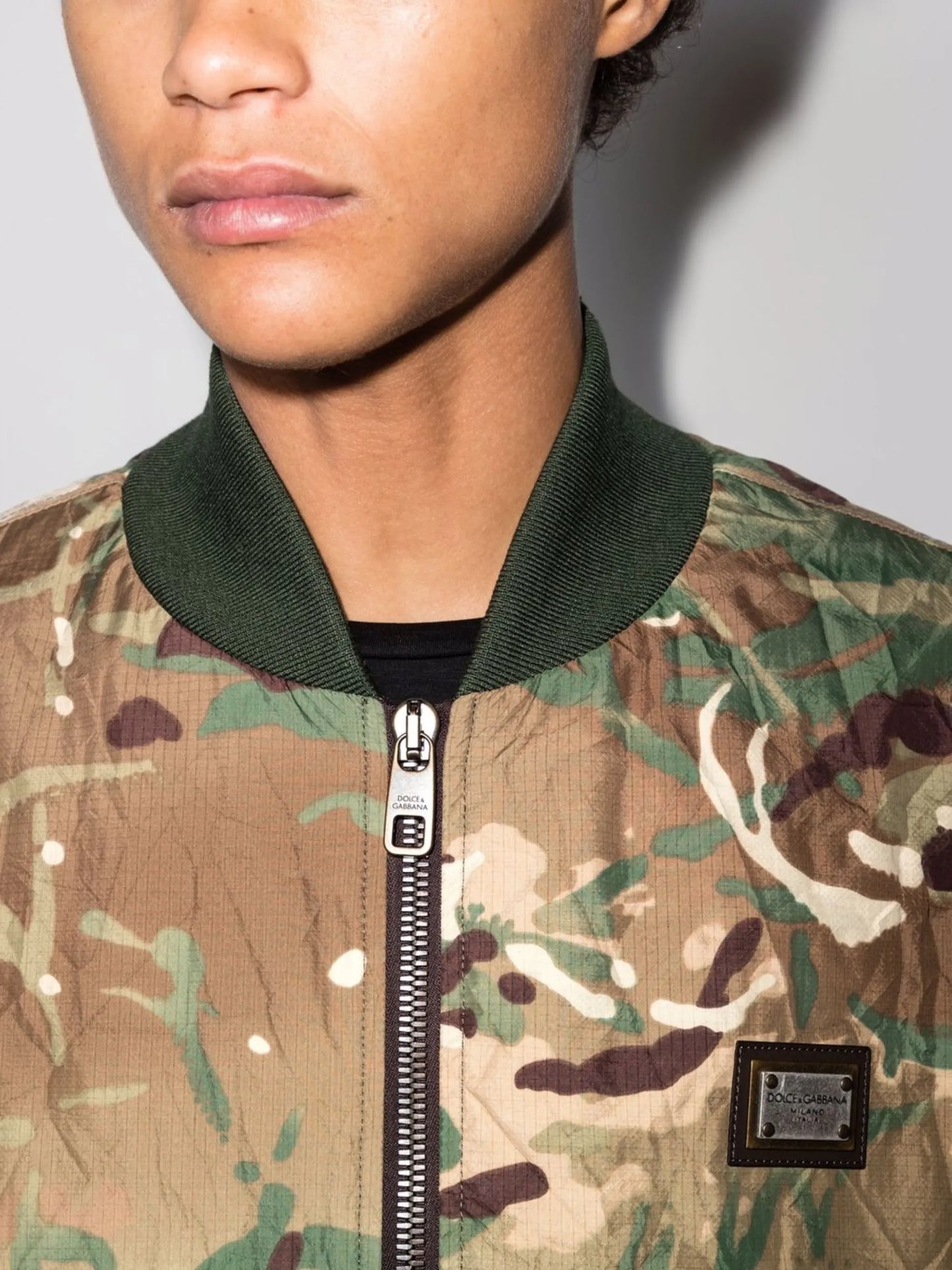 camouflage-print bomber jacket