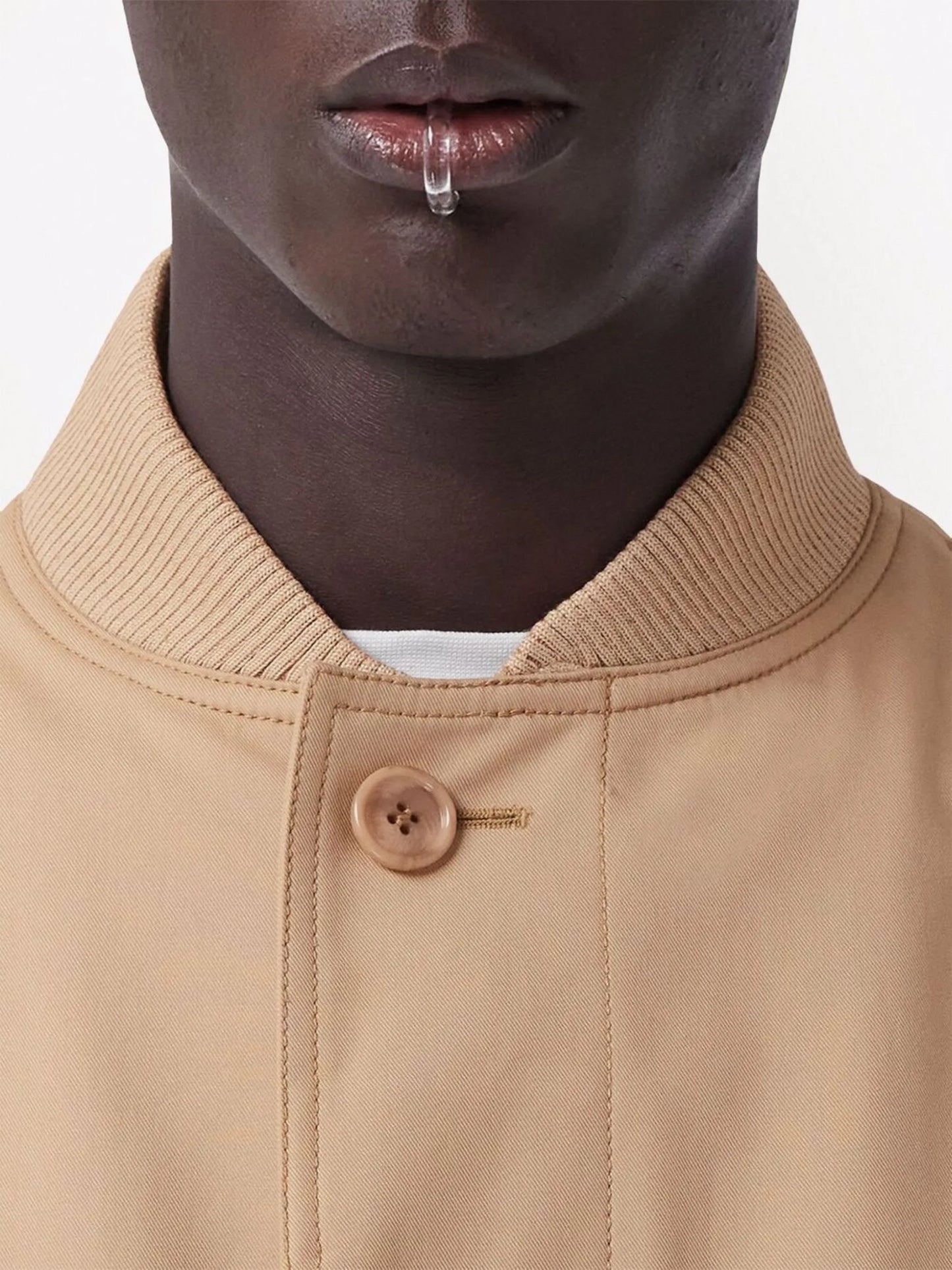 sleeveless gabardine coat