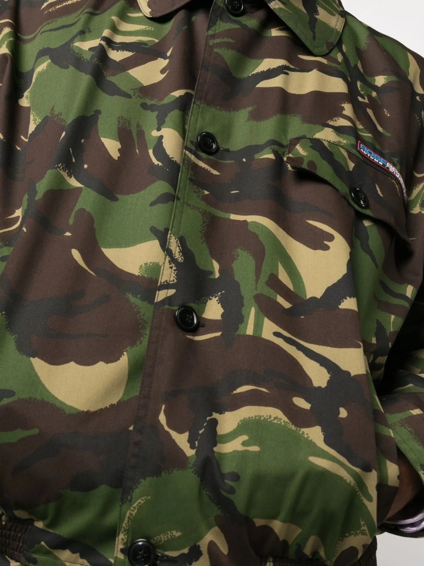 camouflage-print button-fastening jacket