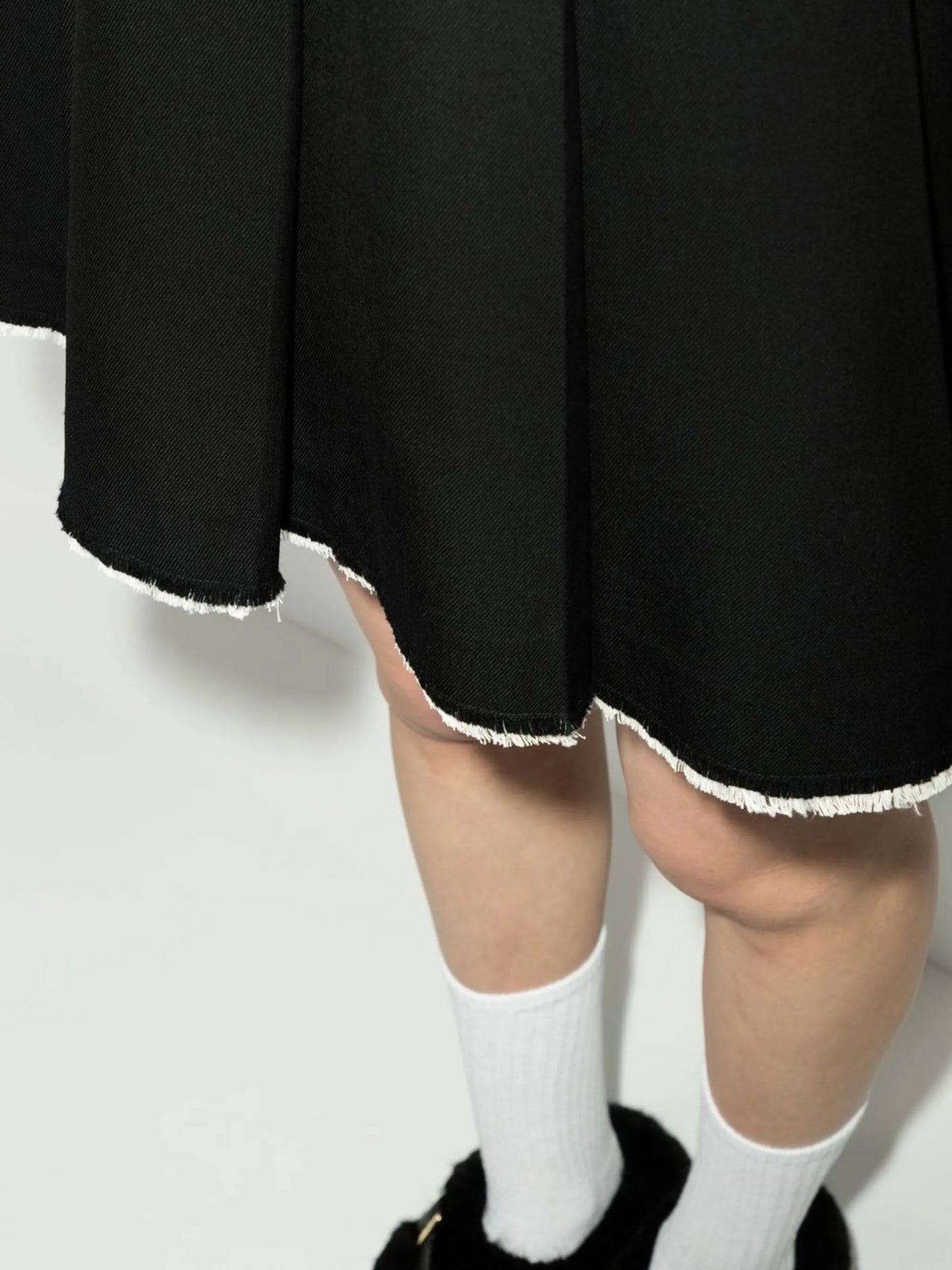 pleated raw-hem skirt