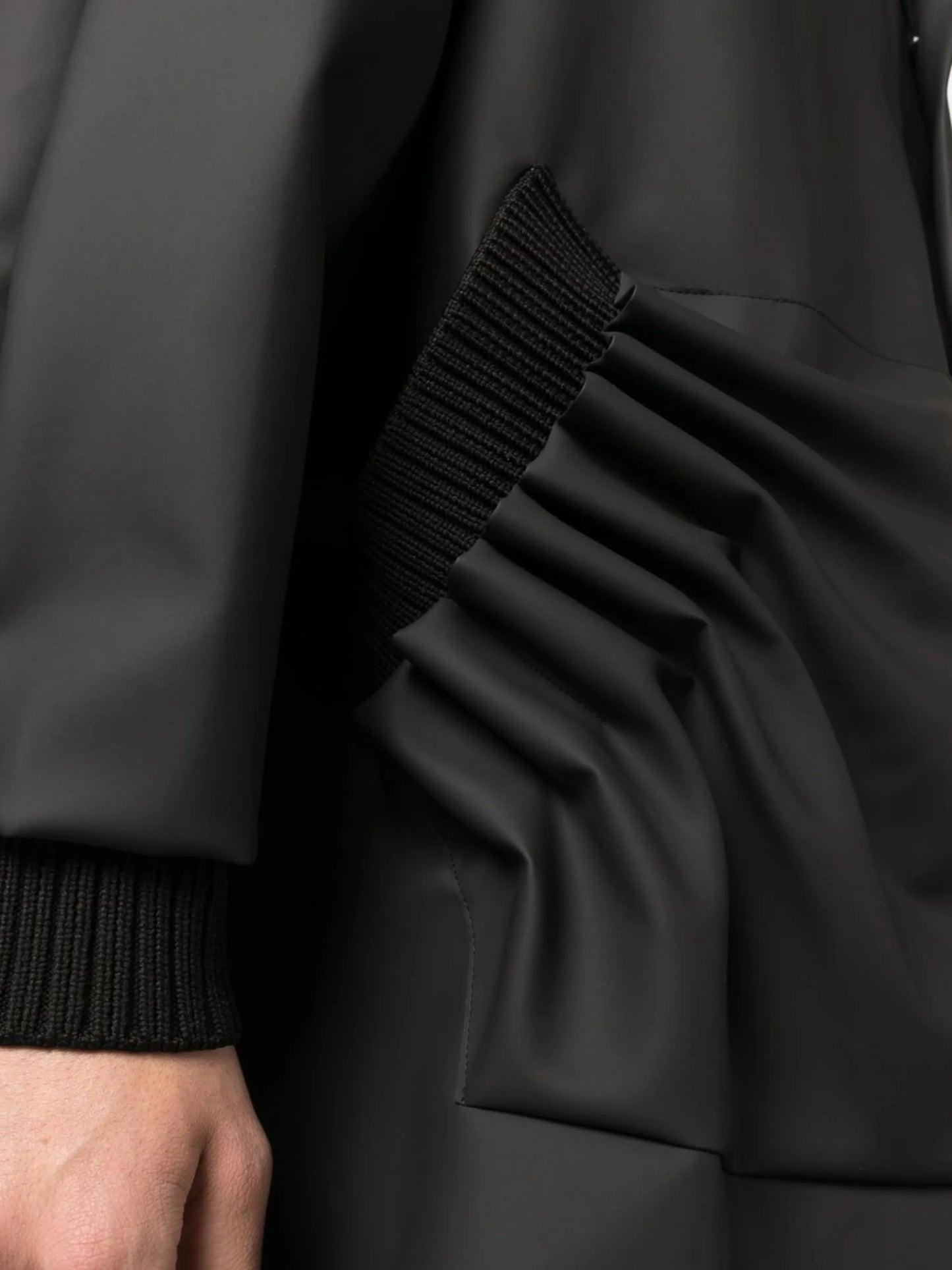 Tube Pleat raincoat
