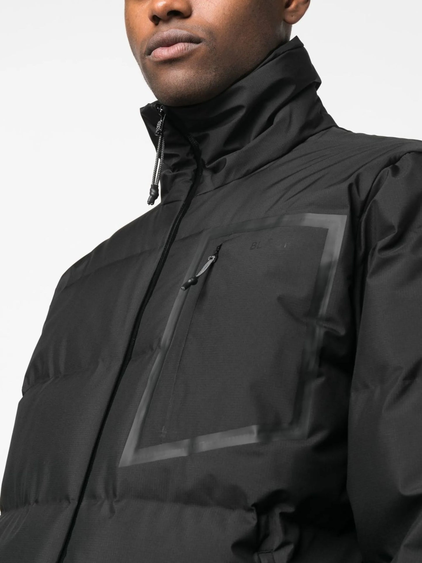 zipped-up padded jacket