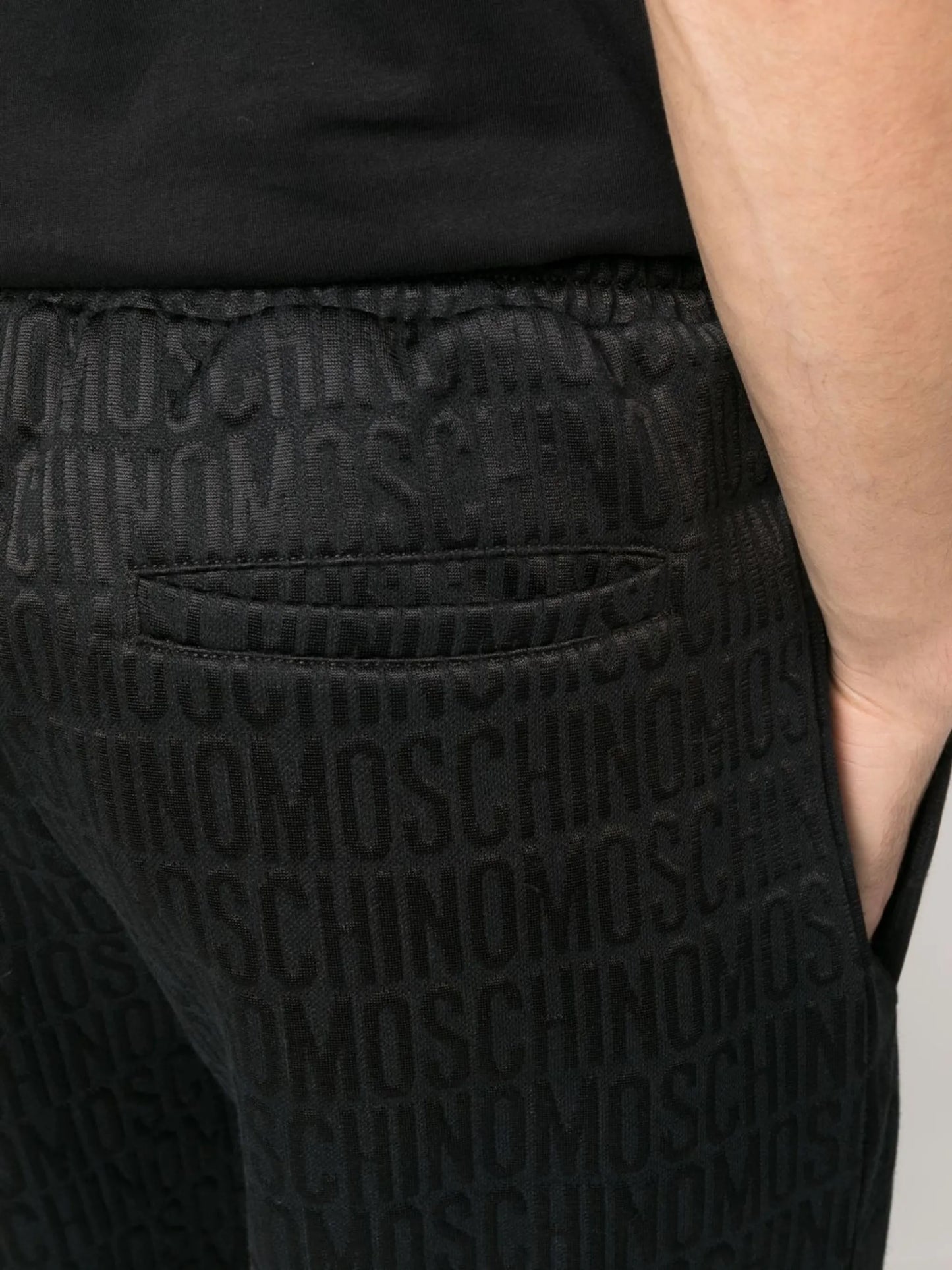 all-over logo-print track pants