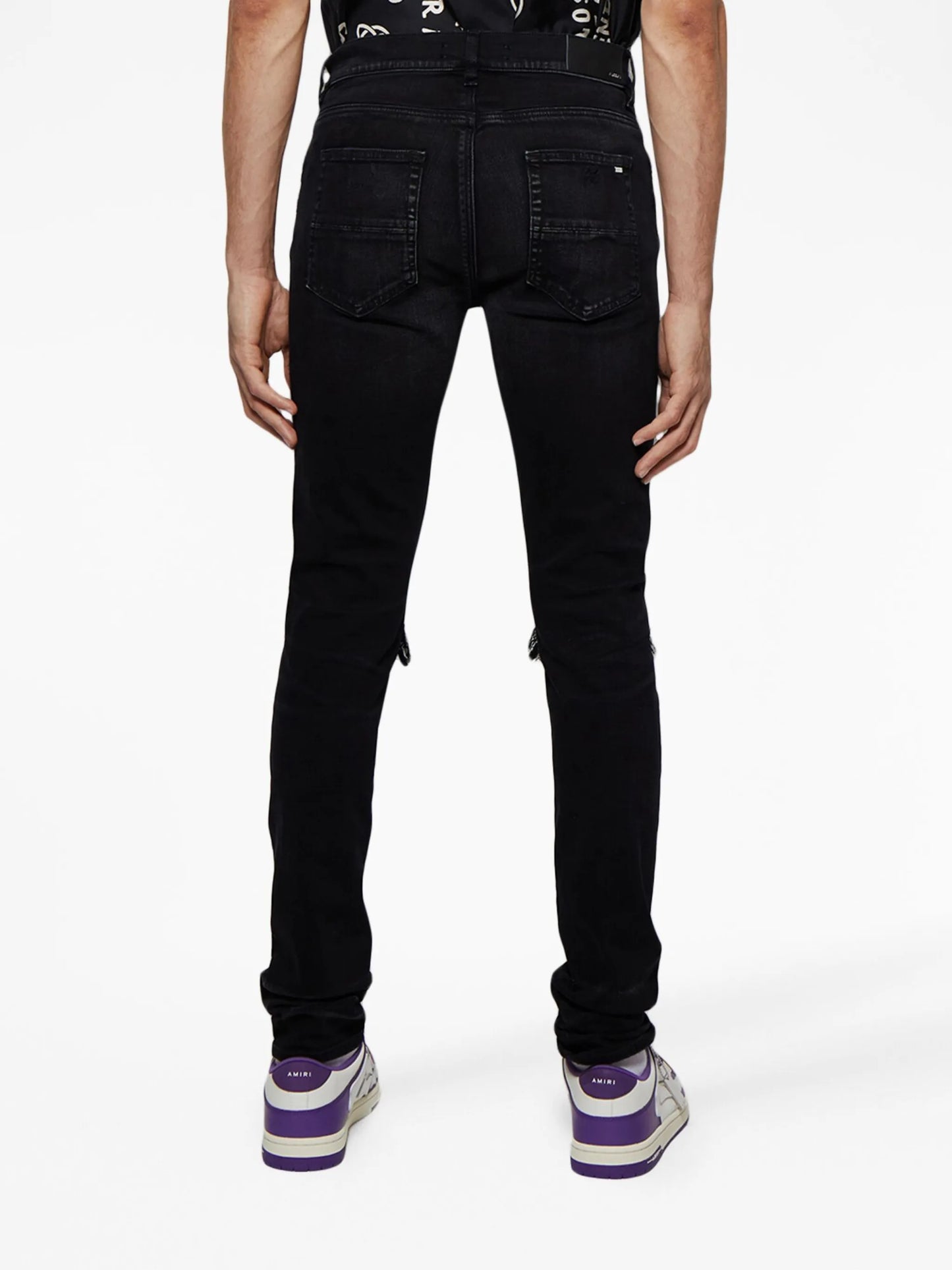 MX1 distressed skinny jeans
