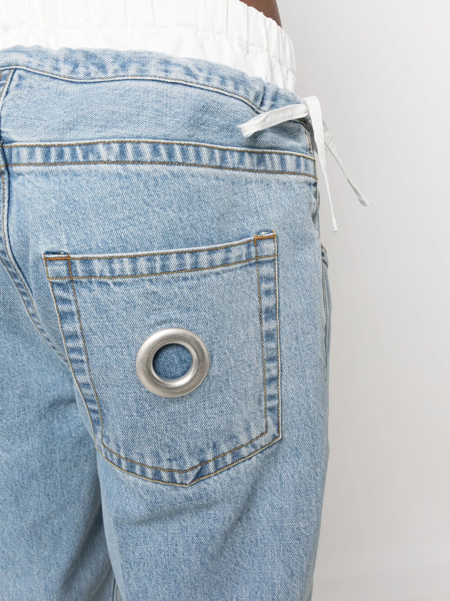 metal-eyelet loose-fit jeans