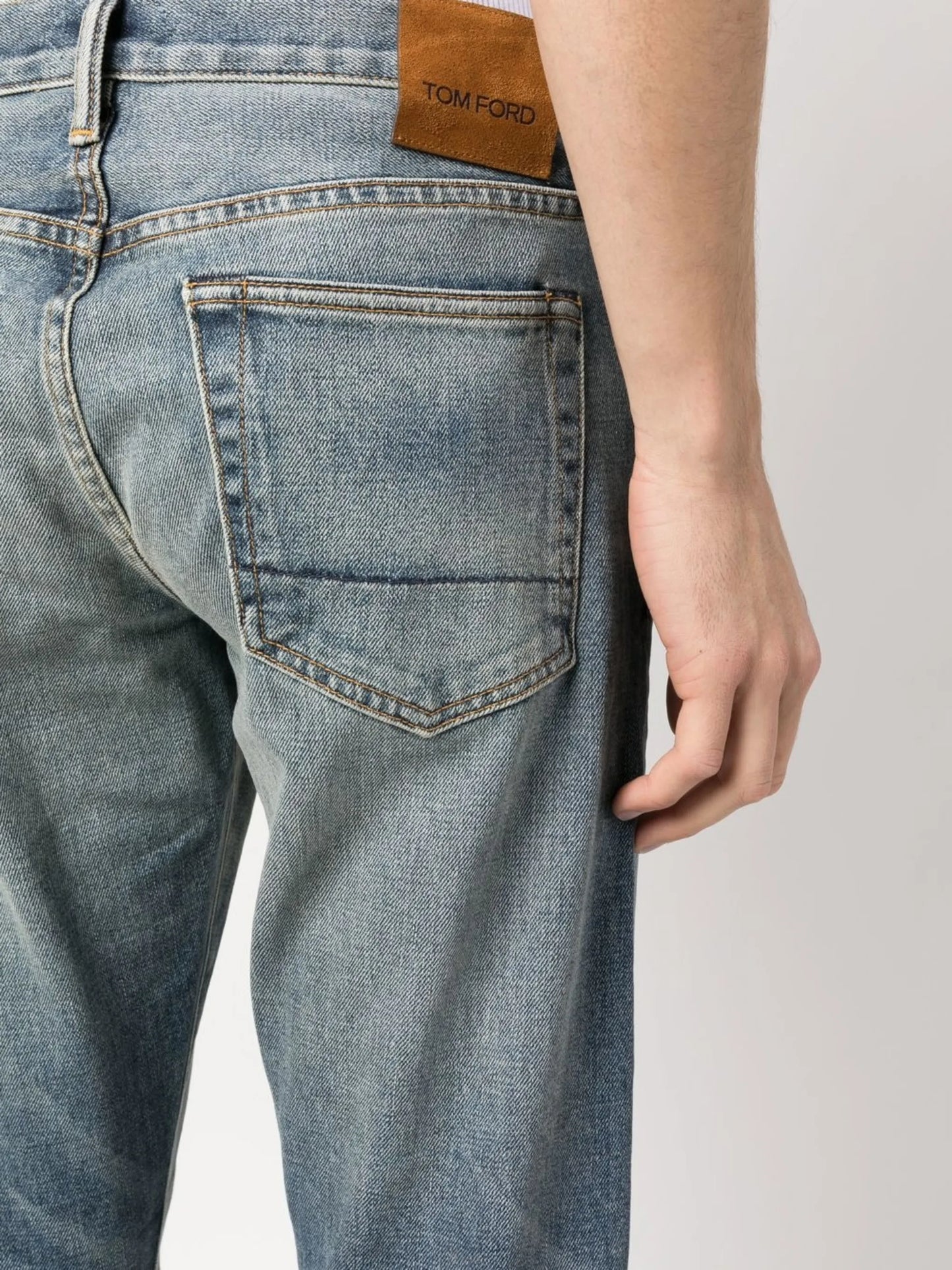 whiskering-effect jeans