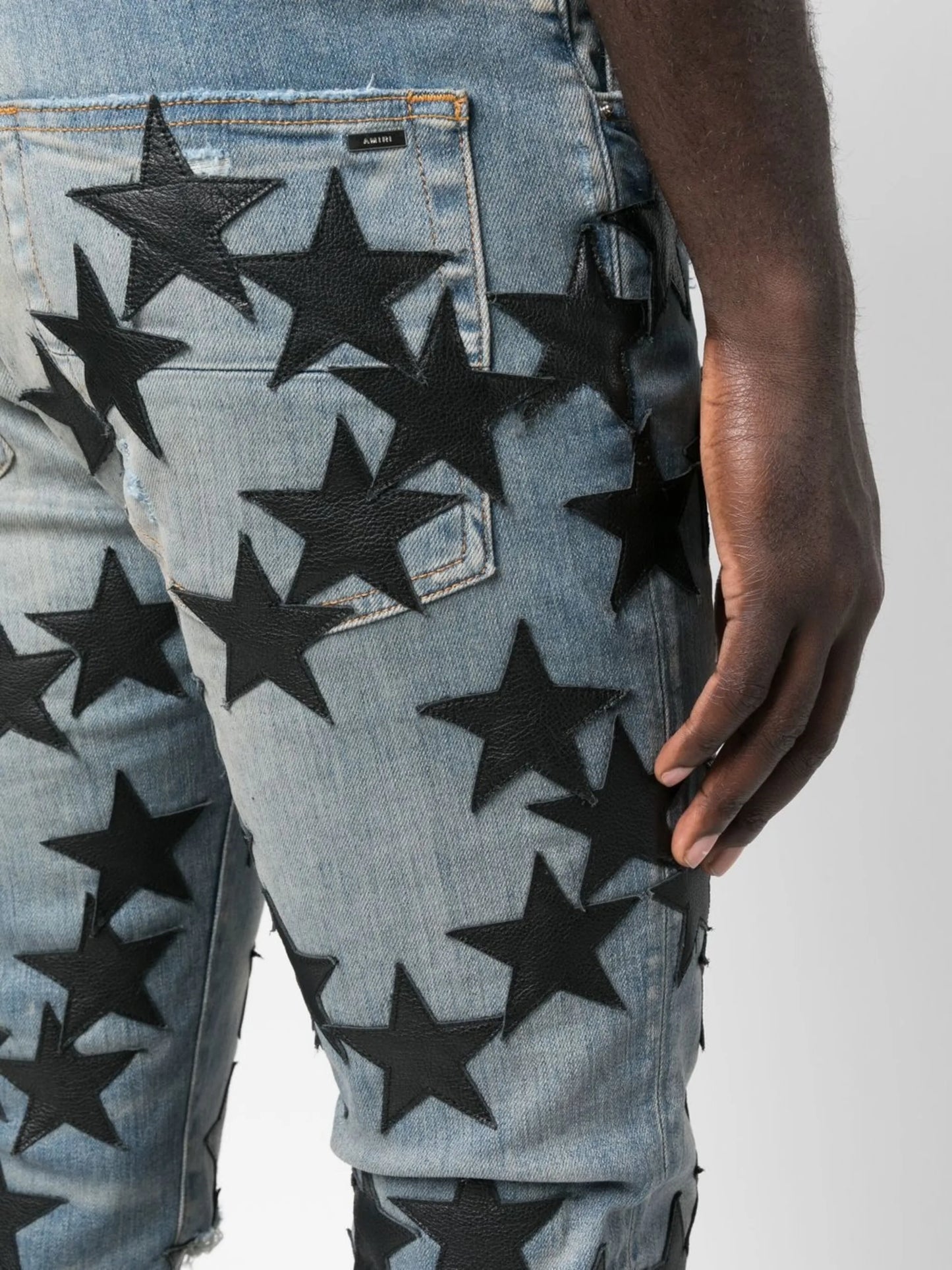 star patch skinny jeans