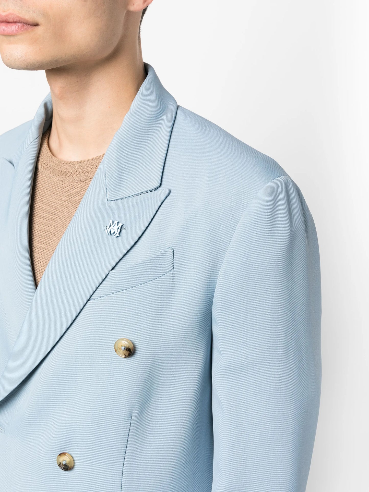 double-breasted button-fastening jacket