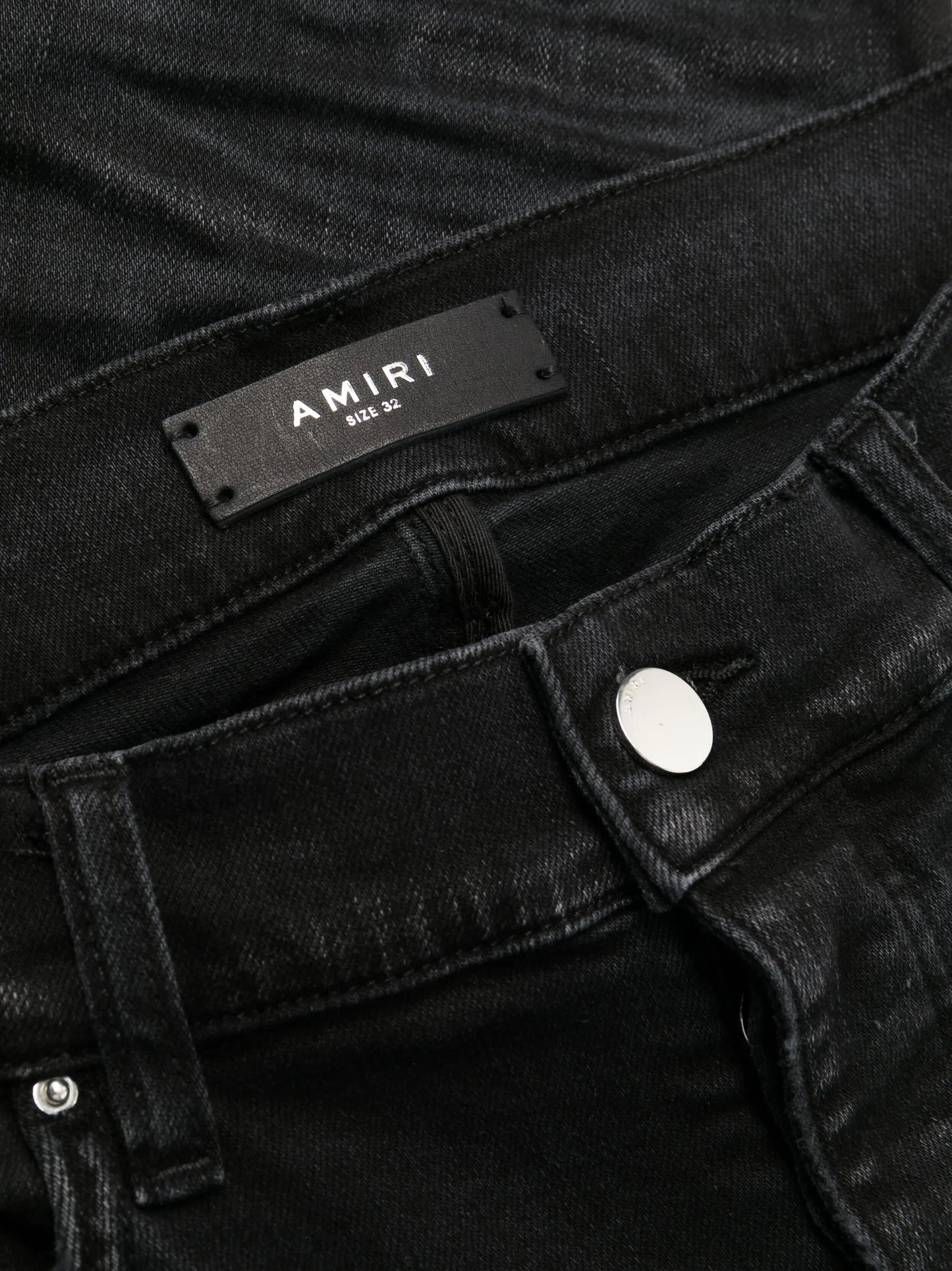 Stack whiskered skinny jeans