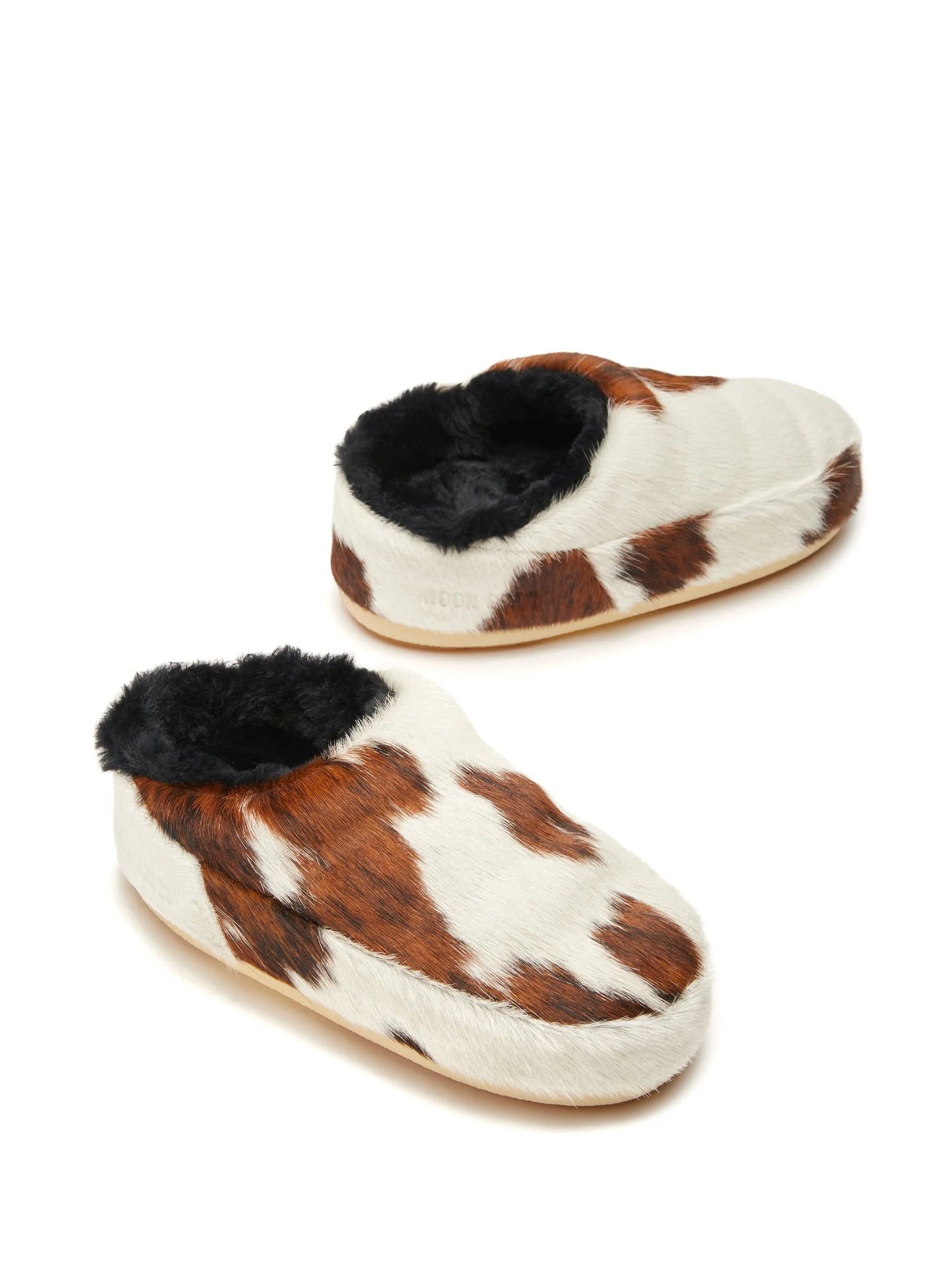 cow-print pony hair mules