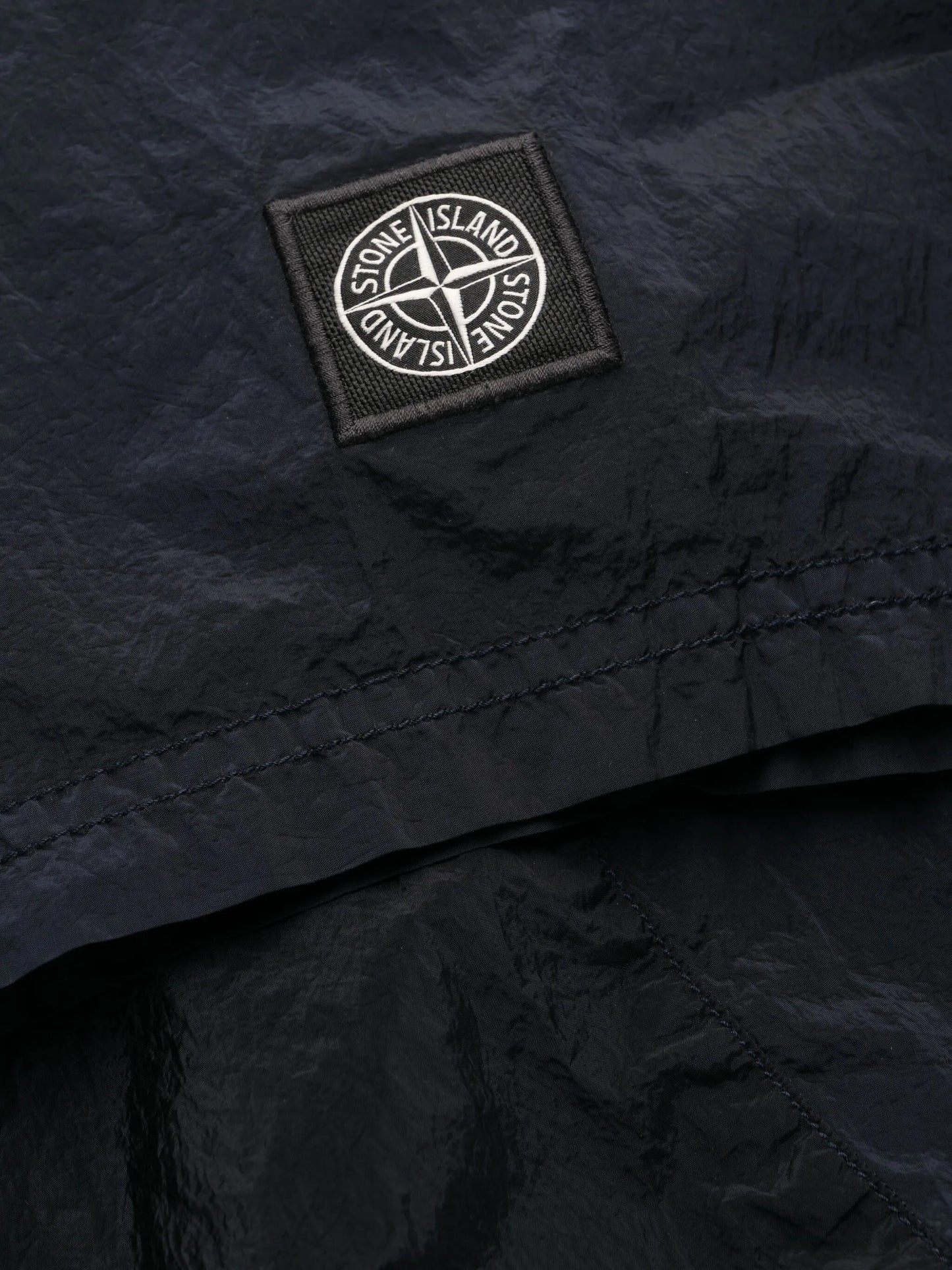 Compass-motif track shorts