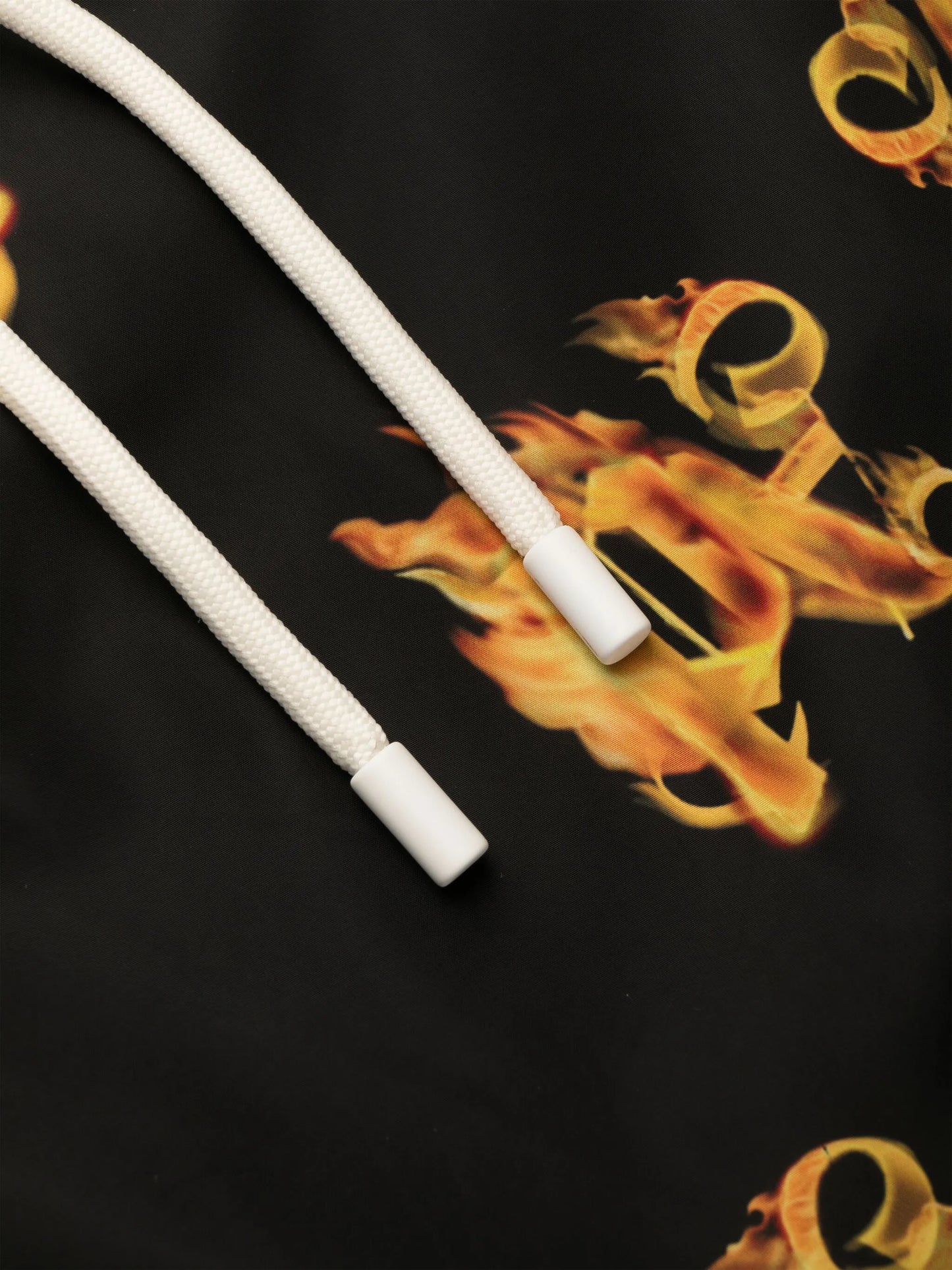 Burning monogram-print swim shorts