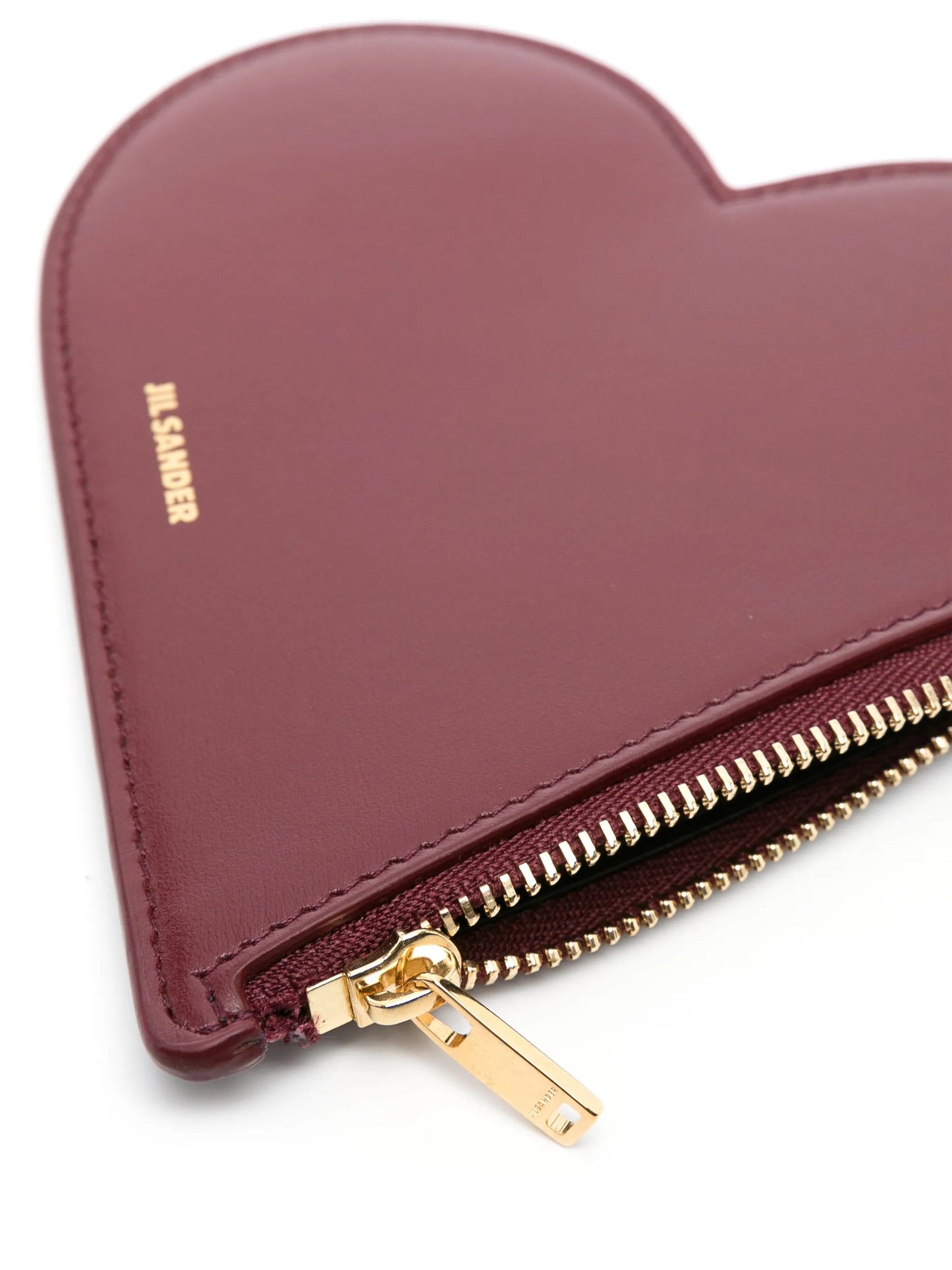 heart-shaped leather pouch