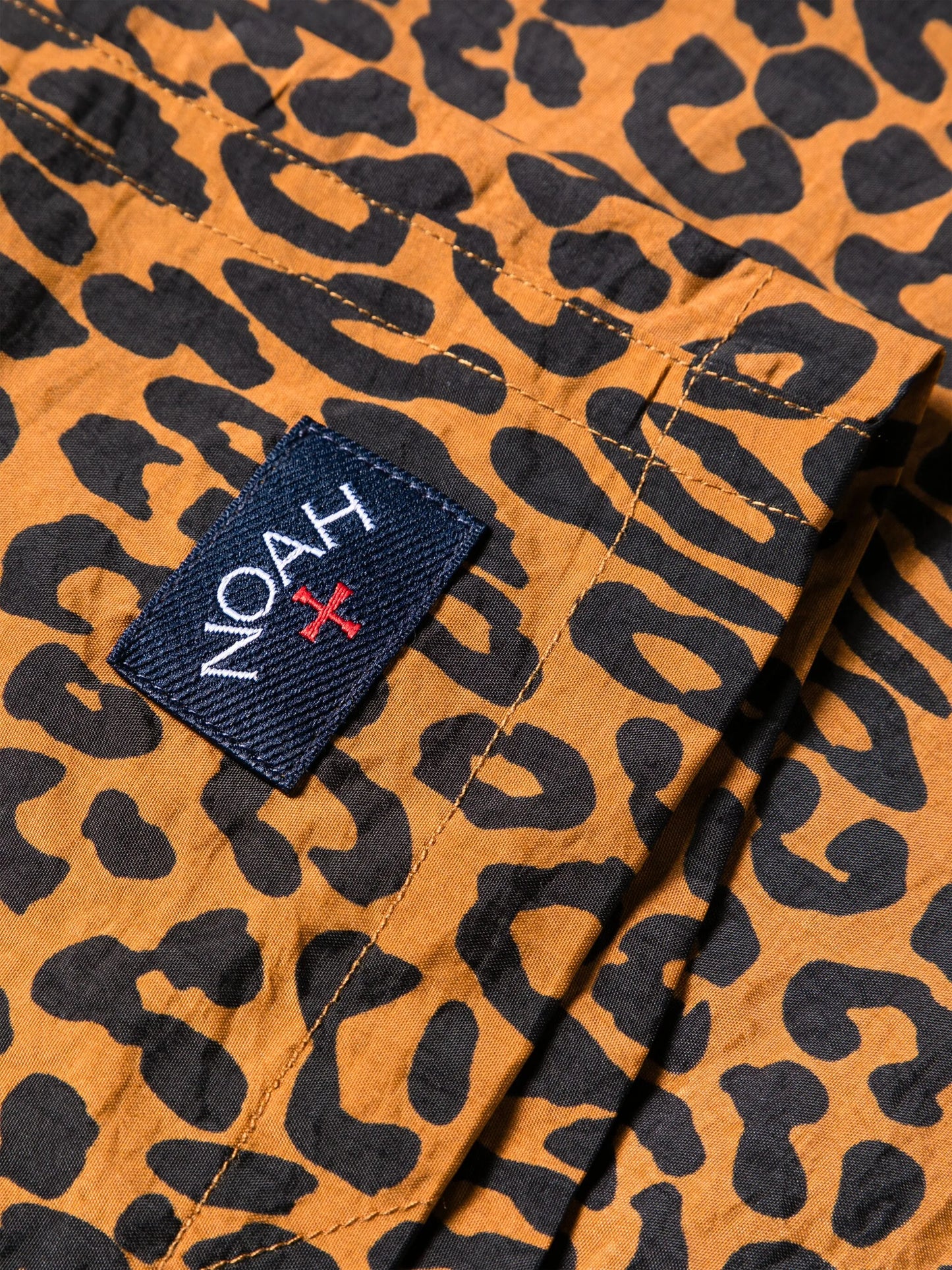 leopard-print swim shorts