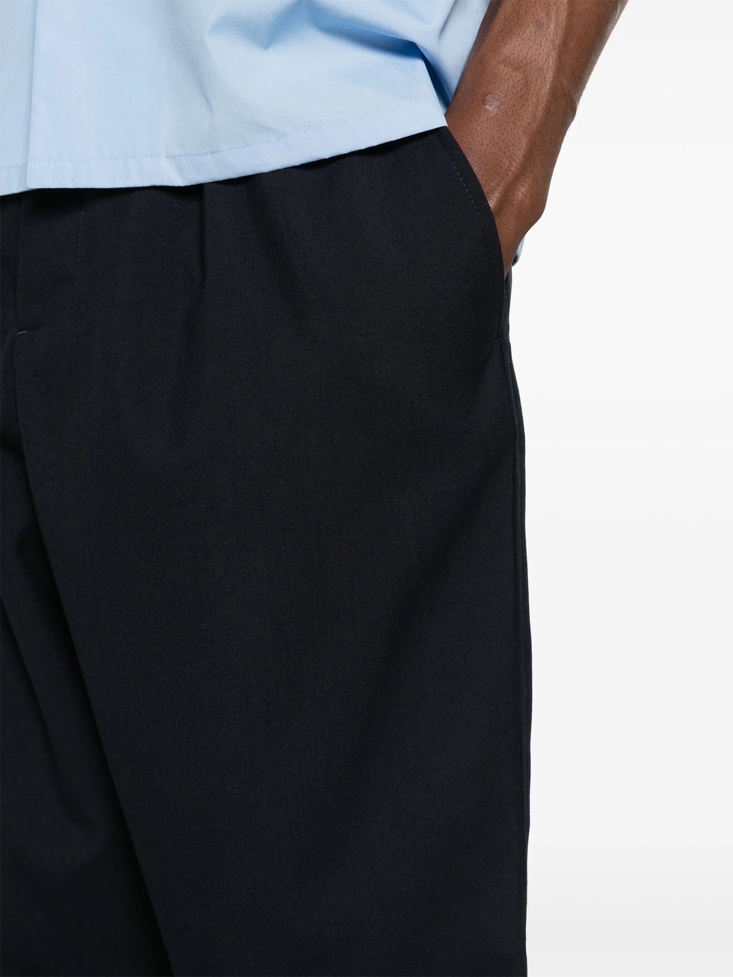 pleat-detail tapered trousers