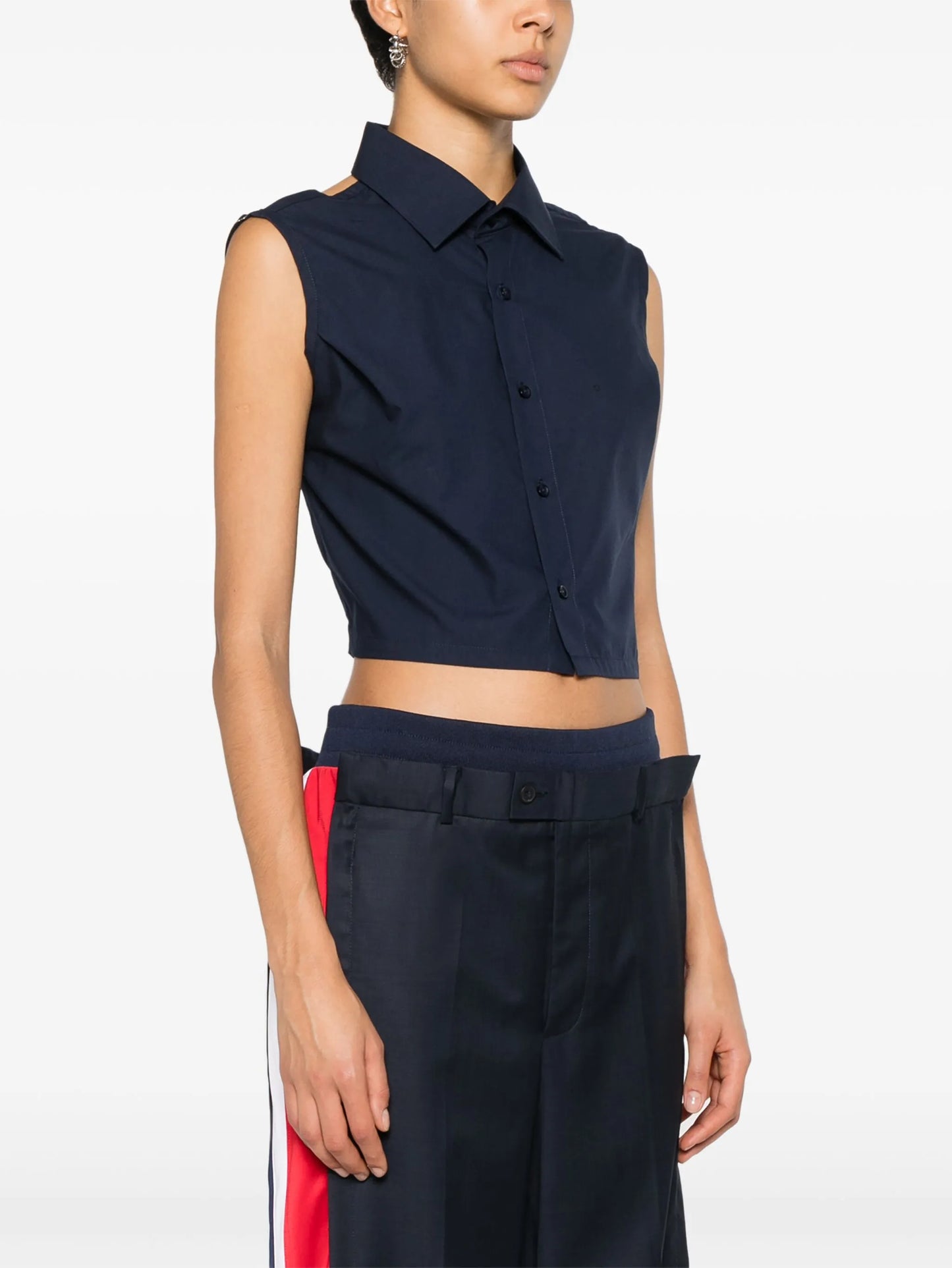 sleeveless open-back shirt