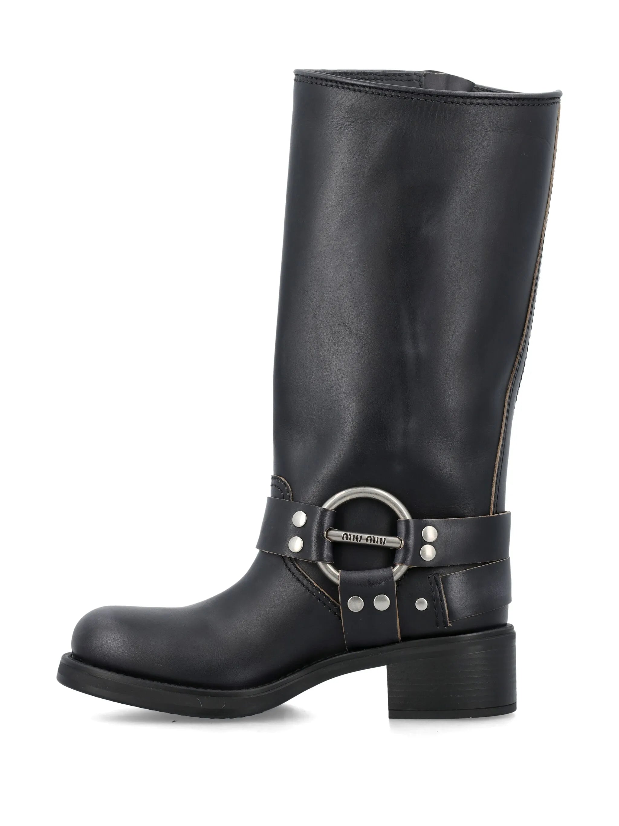 buckled knee-high leather boots