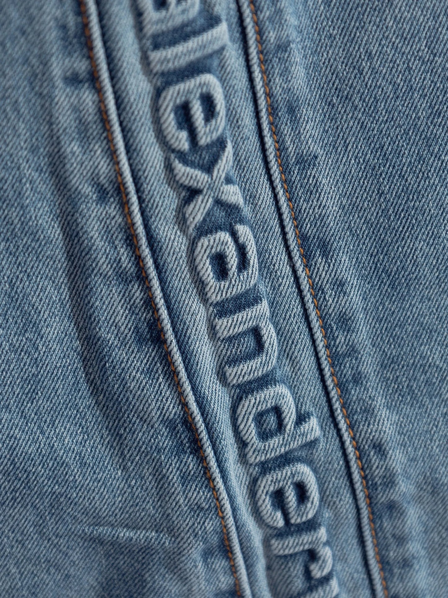 logo-embossed boyfriend jeans
