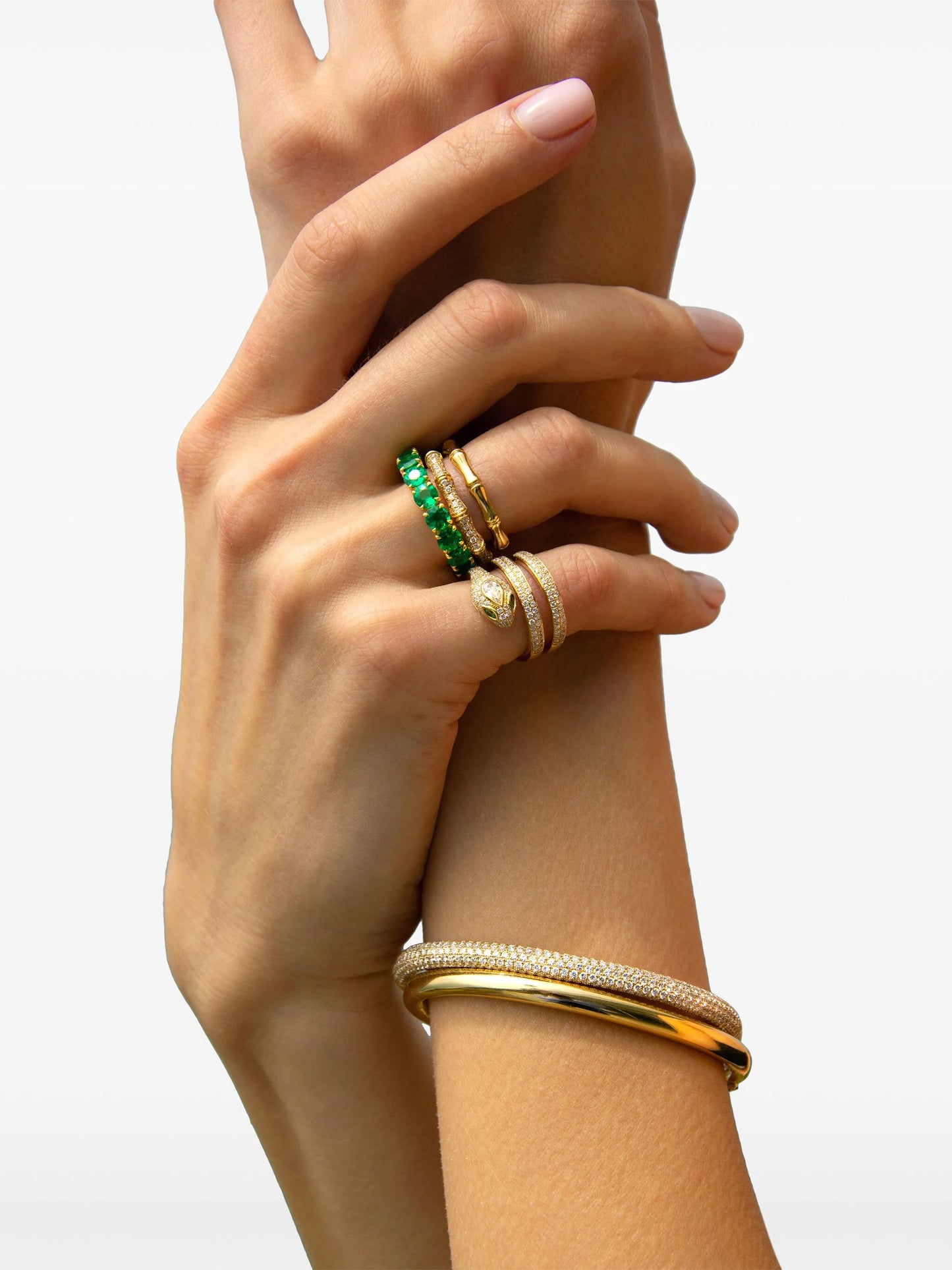 18kt yellow gold snake coil diamond and tsavorite ring
