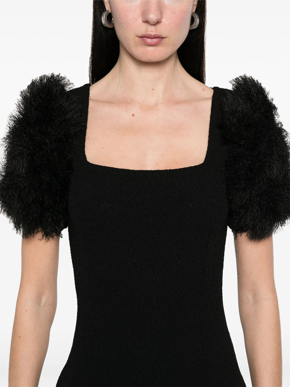 Dress in knit with pompoms