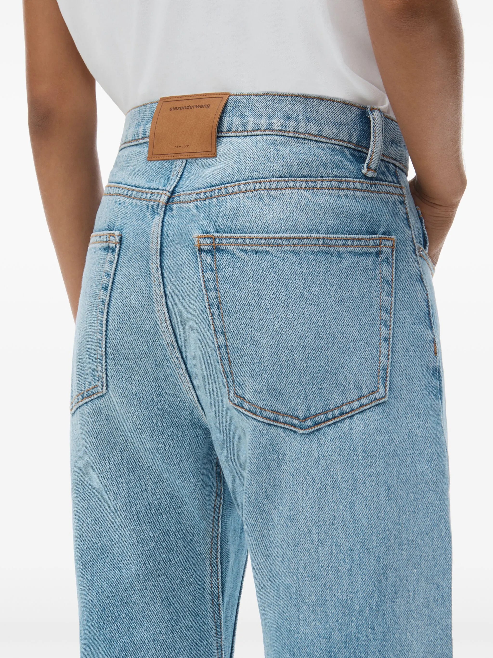 logo-embossed jeans
