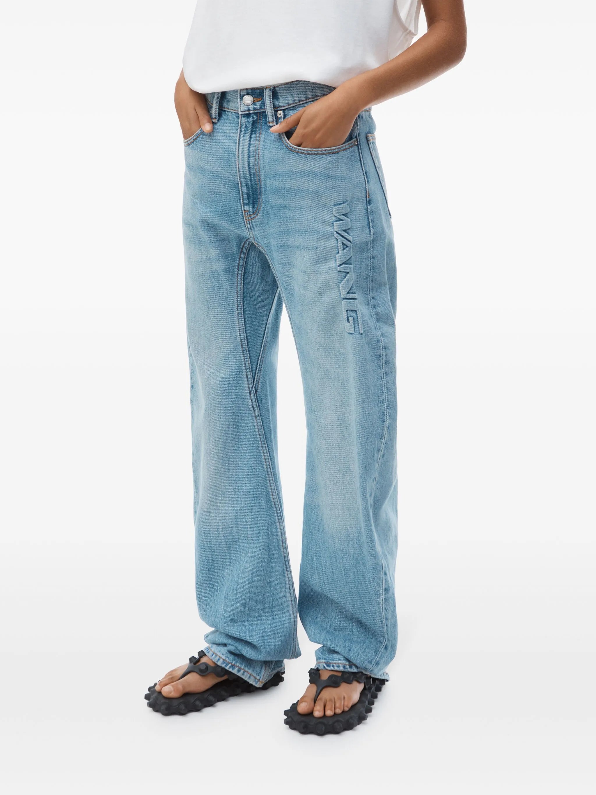 logo-embossed jeans
