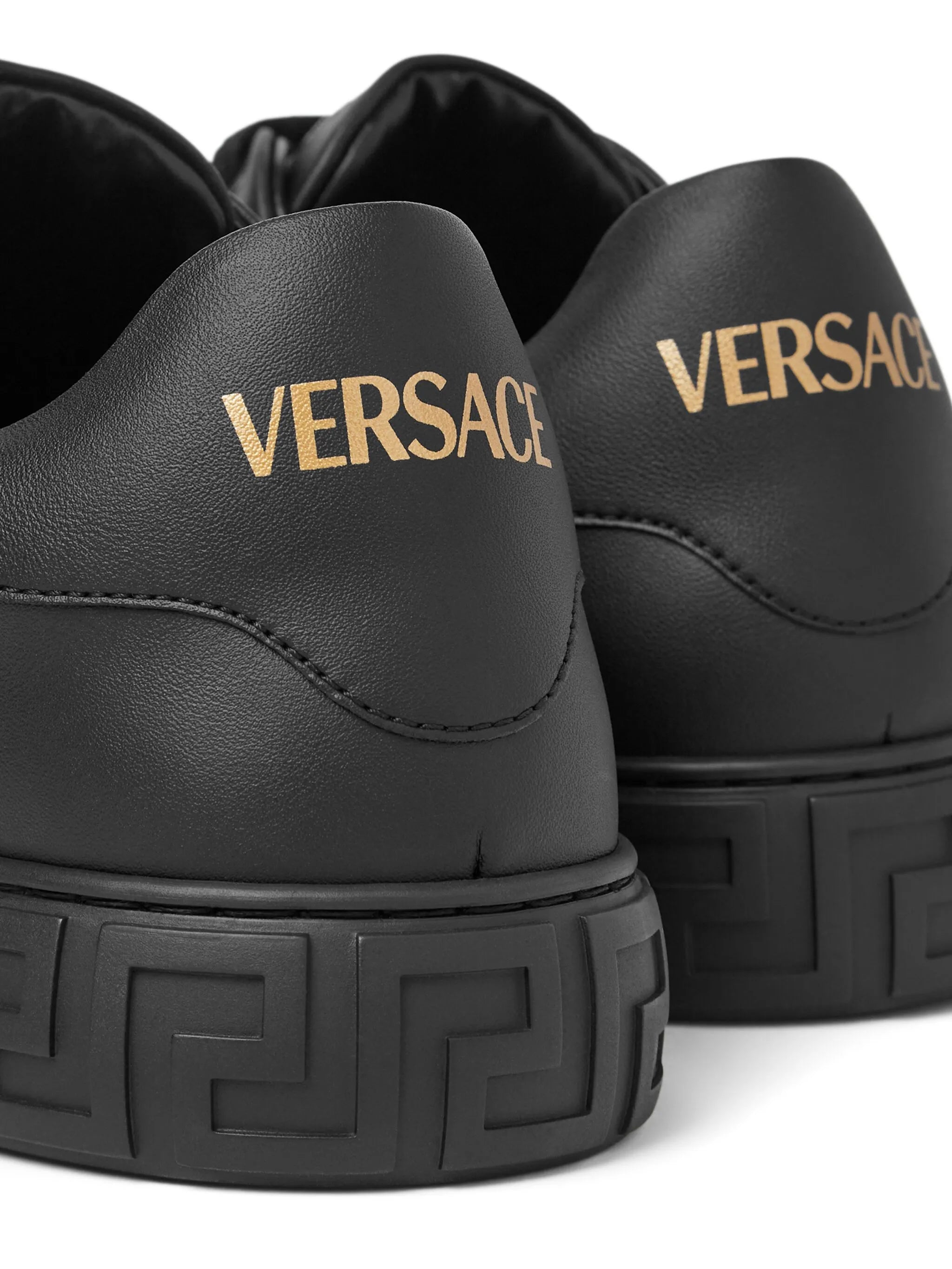 Greca studded sneakers