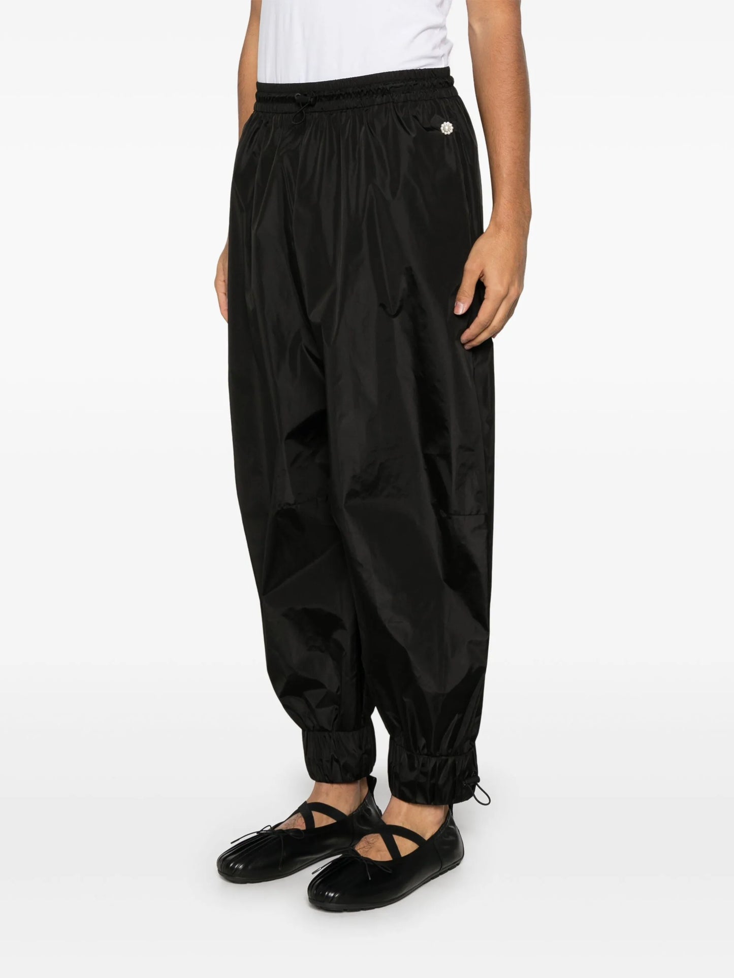 daisy-embellished track pants