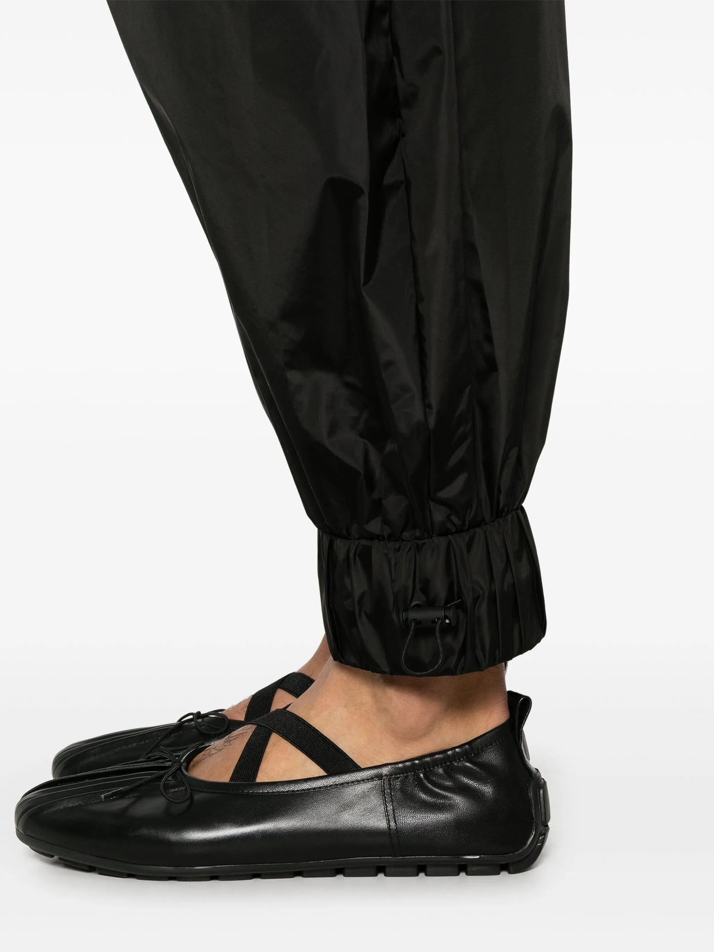 daisy-embellished track pants
