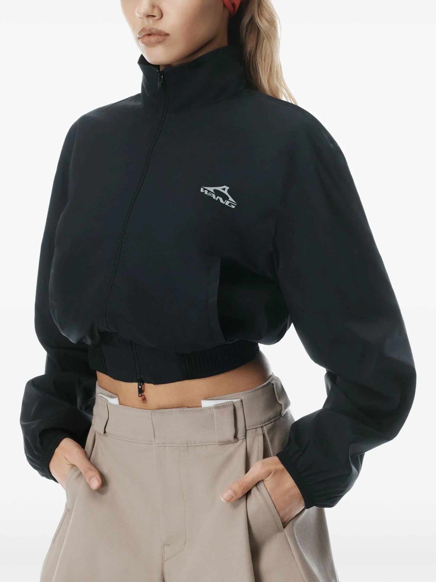 high-waisted pleated shorts