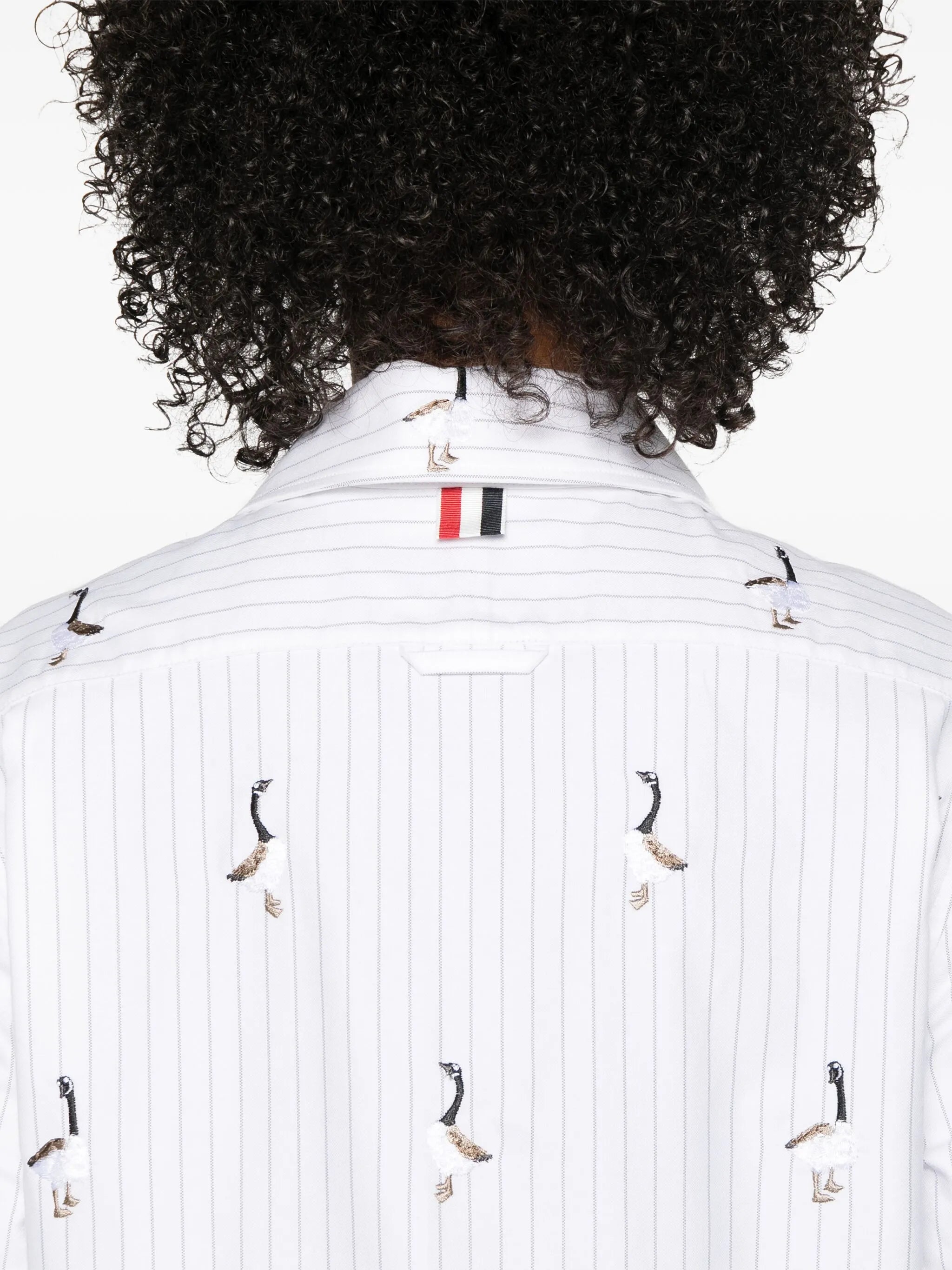 pleated-hem striped shirt