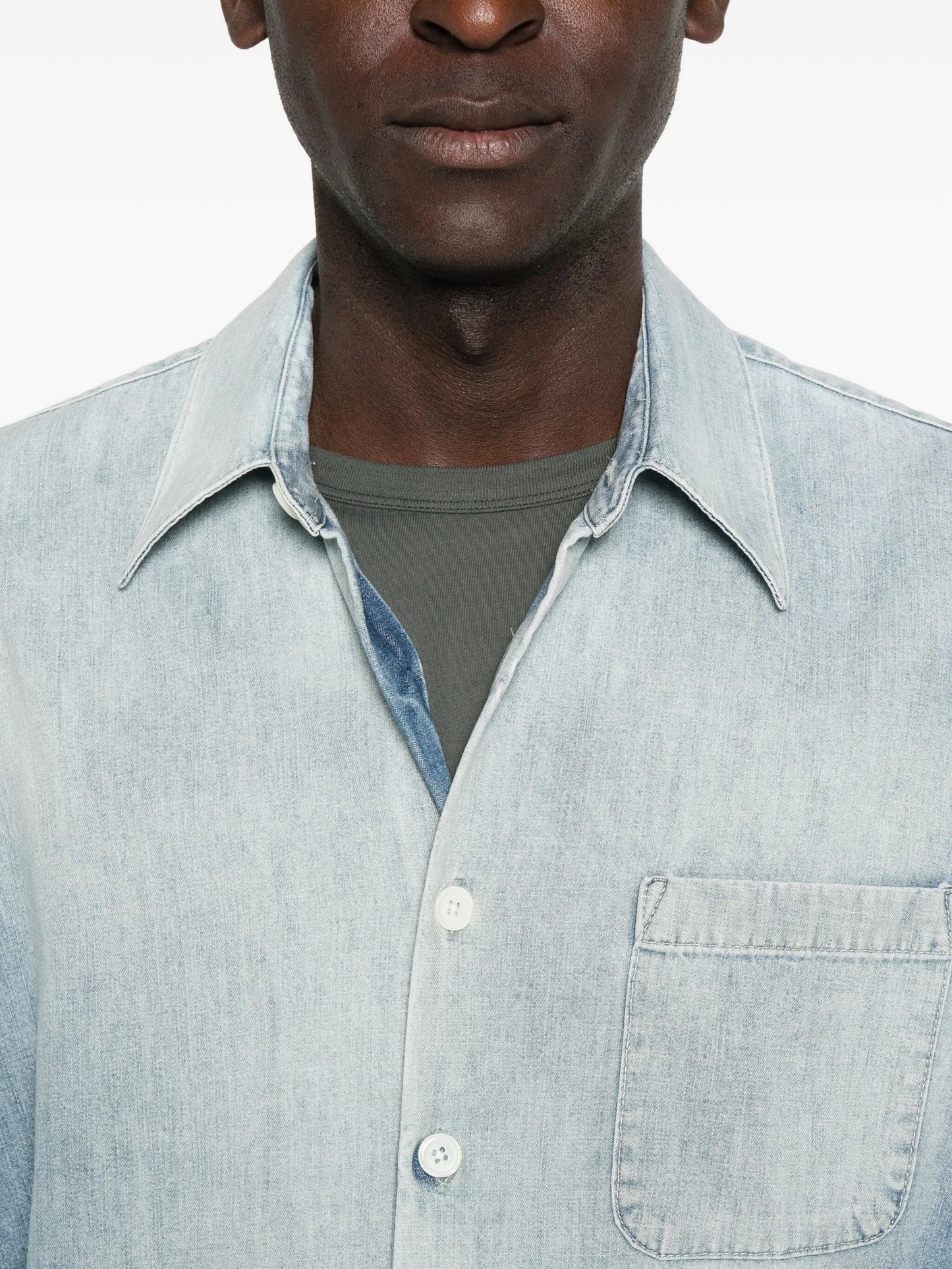 Above denim shirt