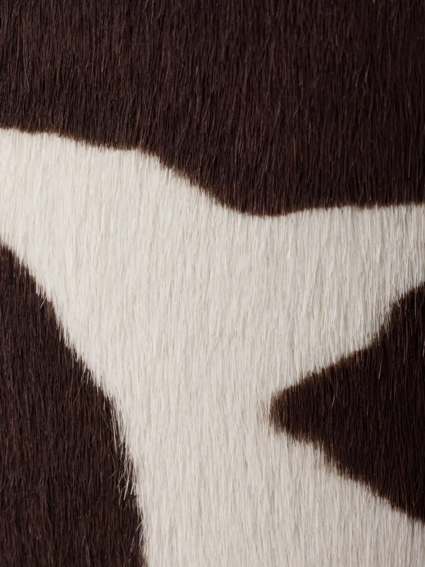 cow-print slip-on mules