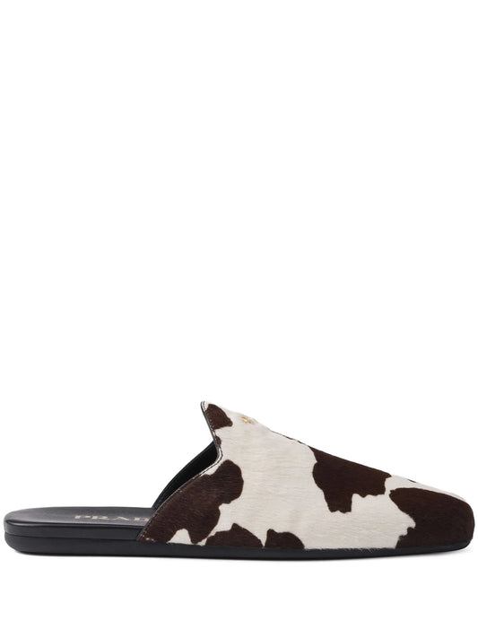 cow-print slip-on mules