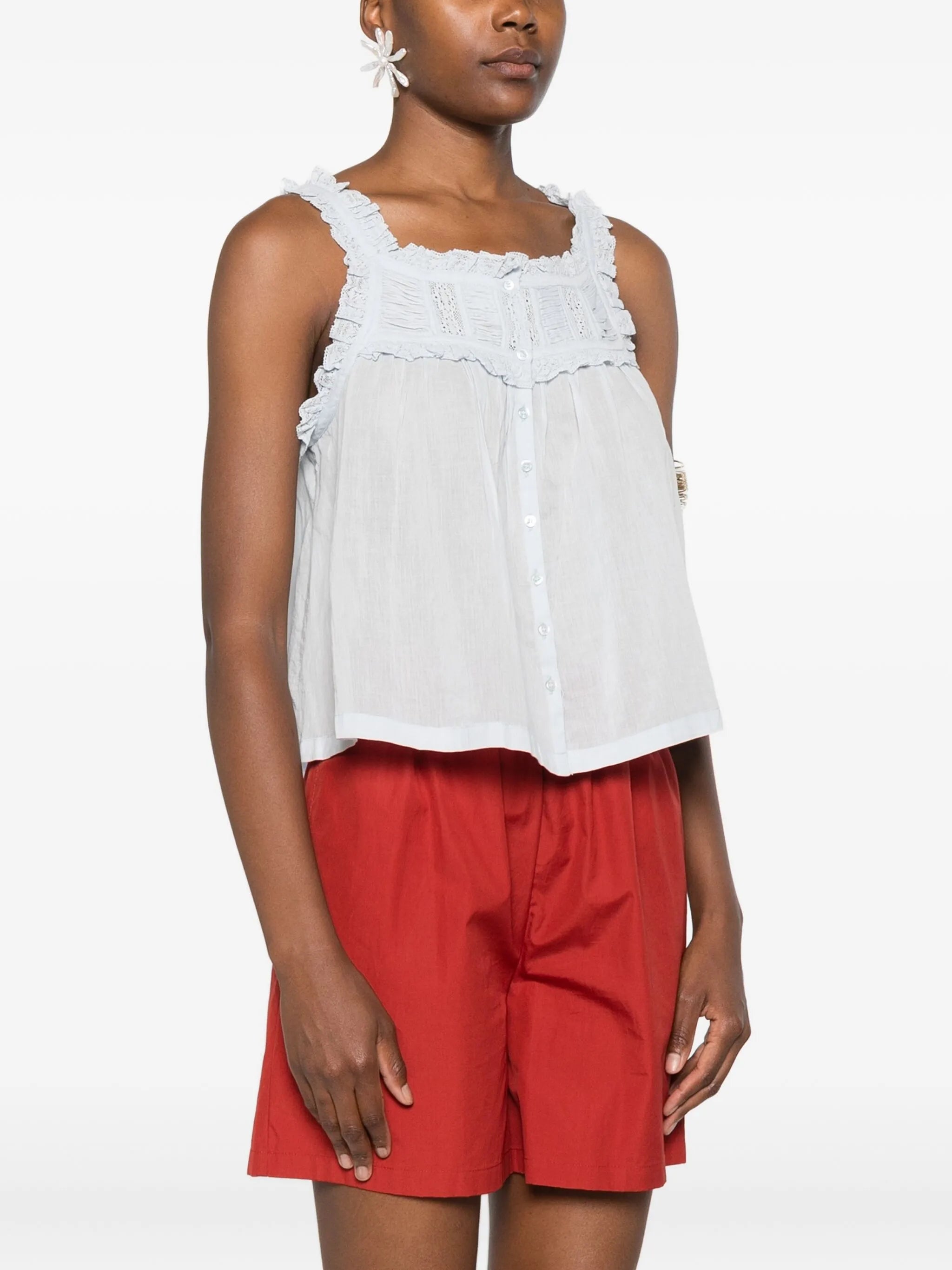 frill-trimmed button top