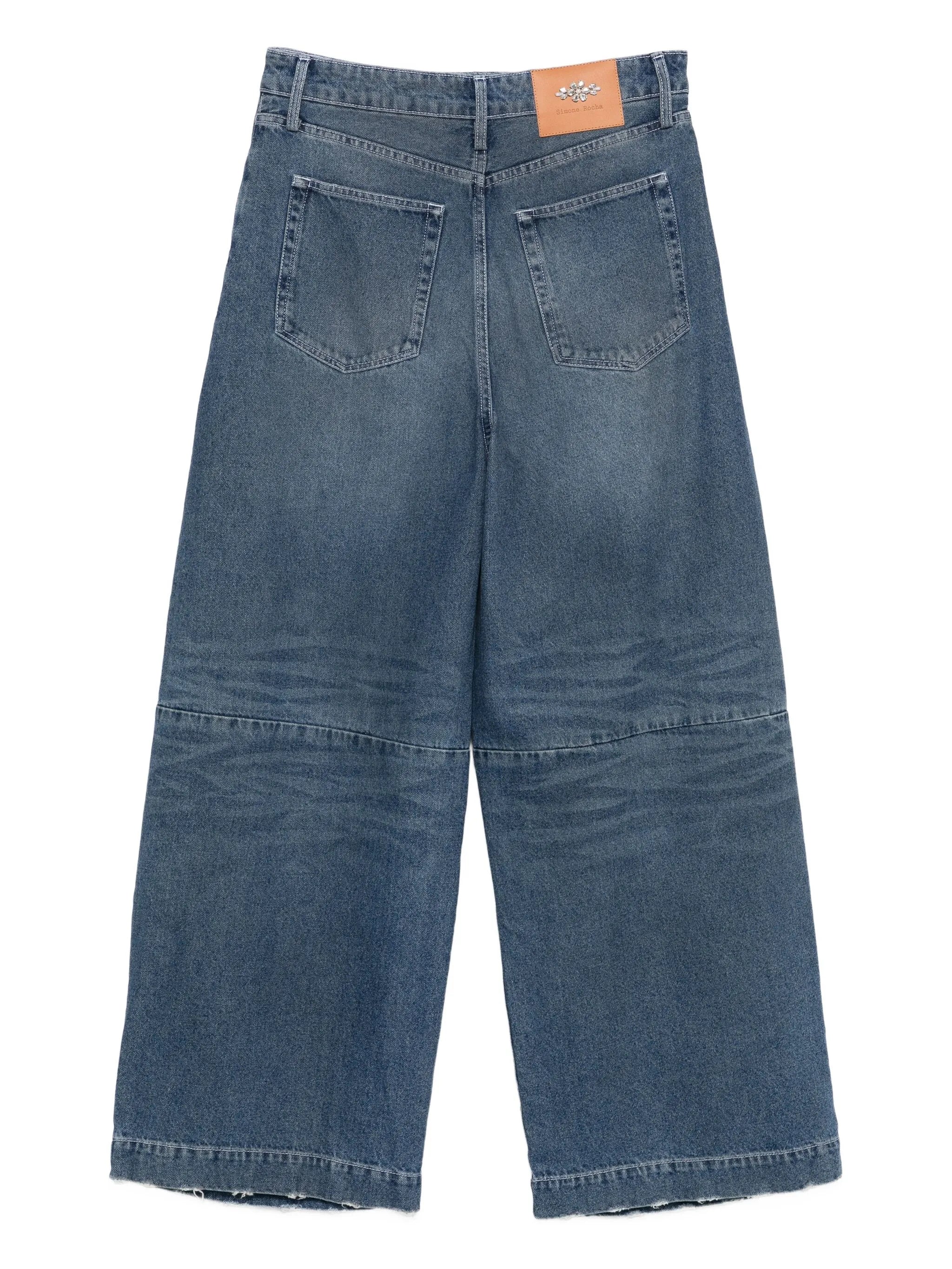 distressed puddle jeans