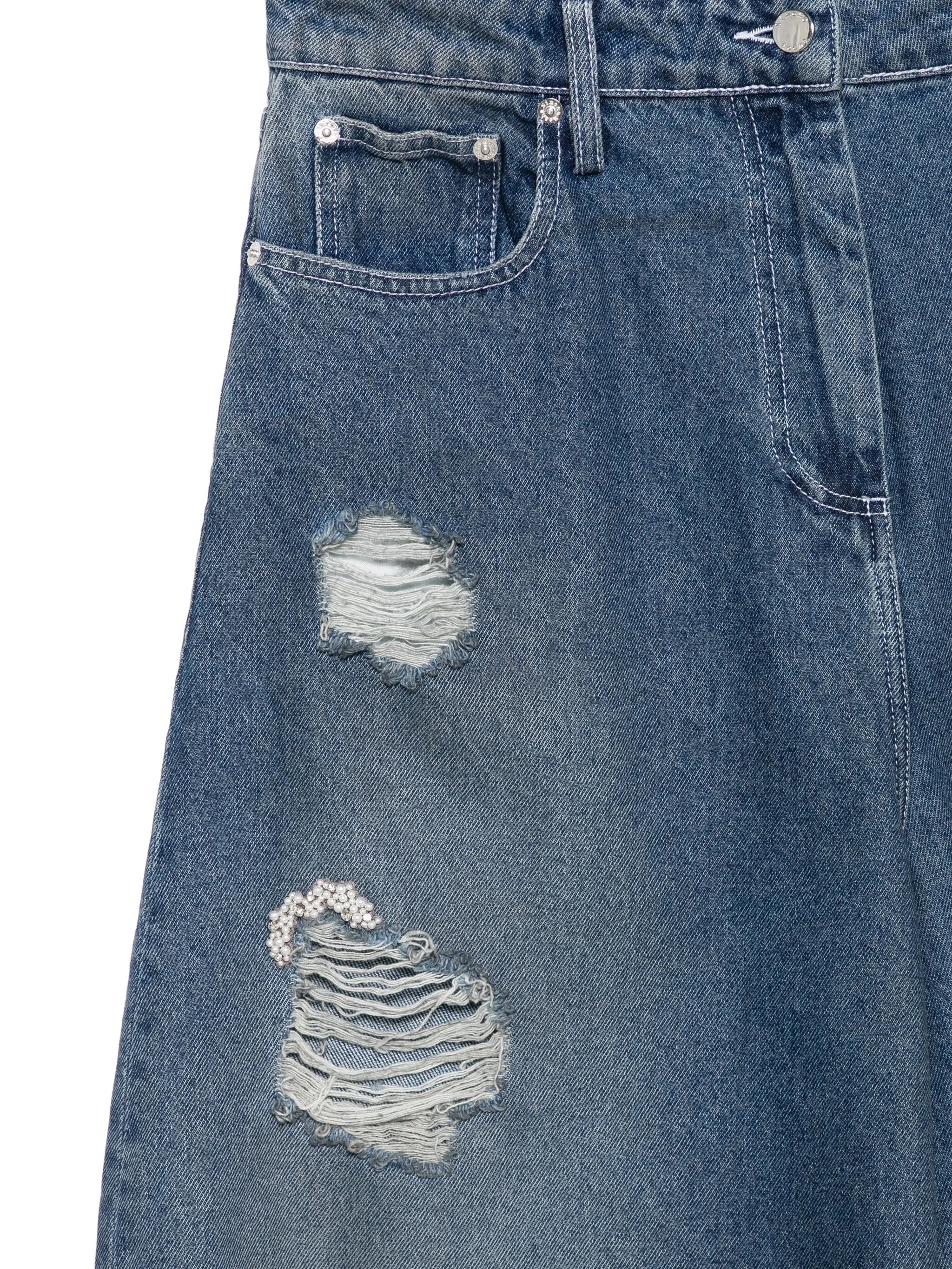distressed puddle jeans