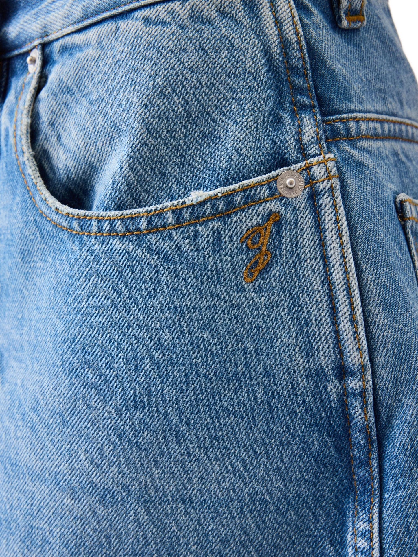 pleated-detail faded-effect jeans