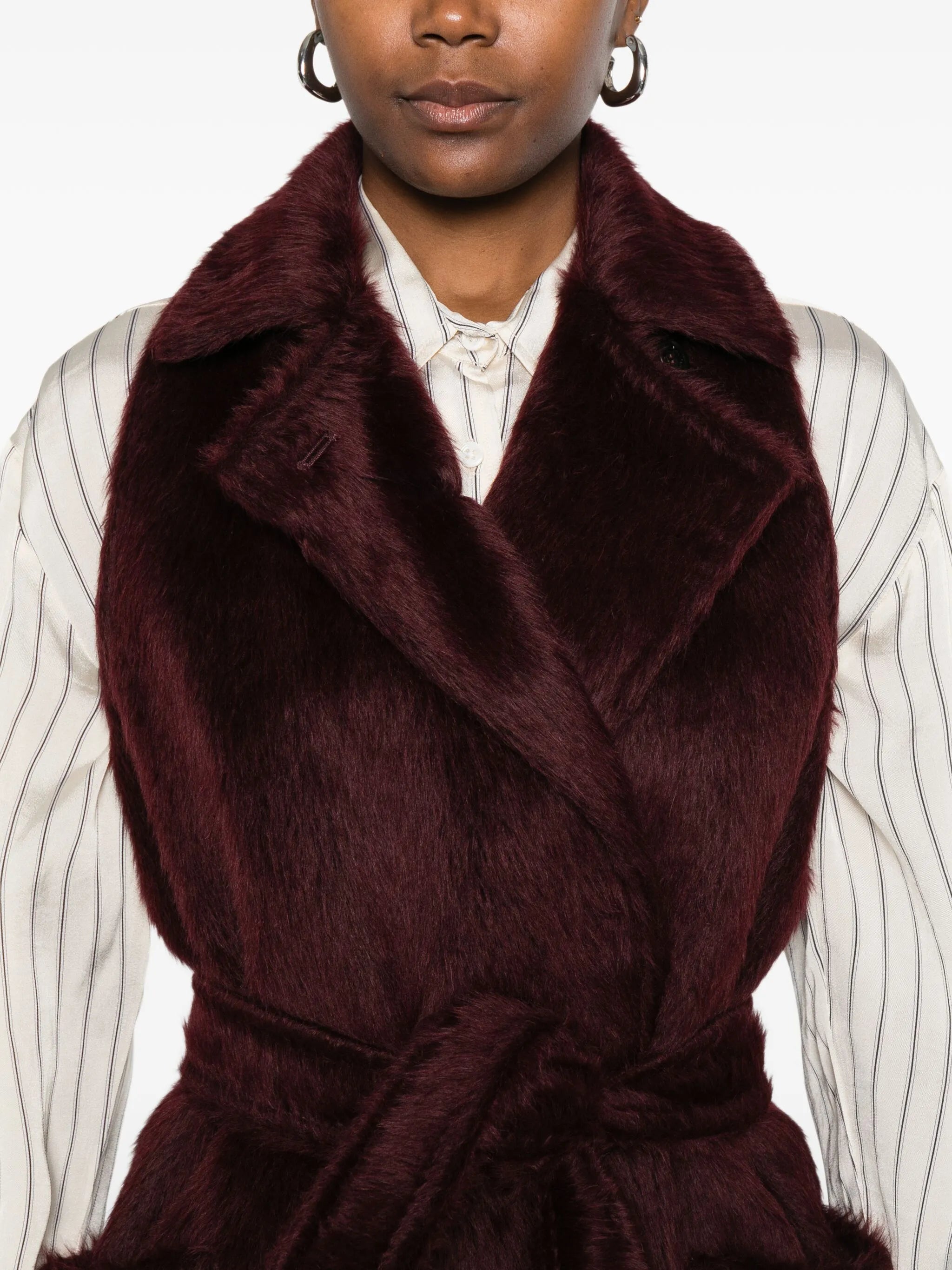 belted sleeveless coat