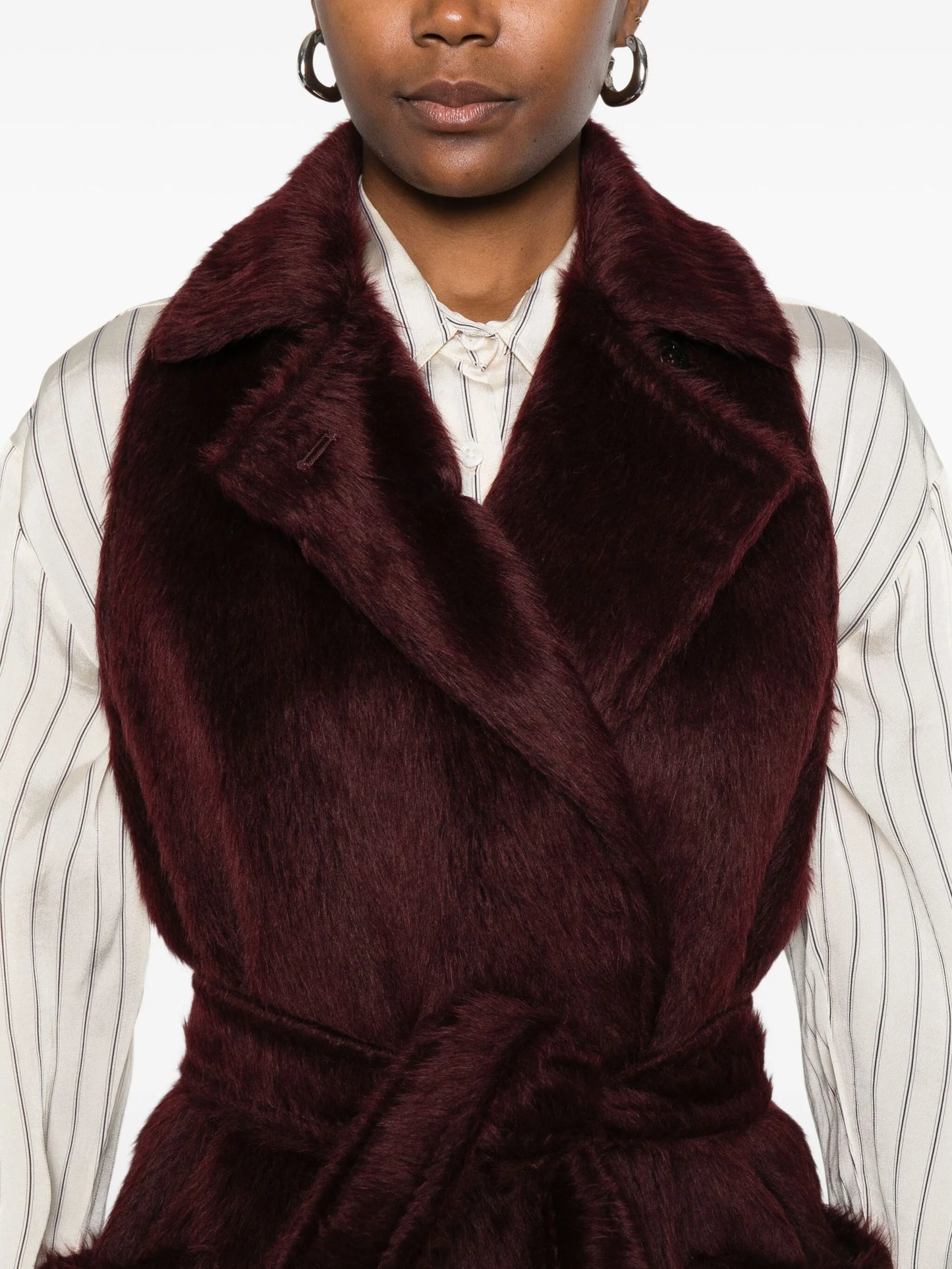 belted sleeveless coat